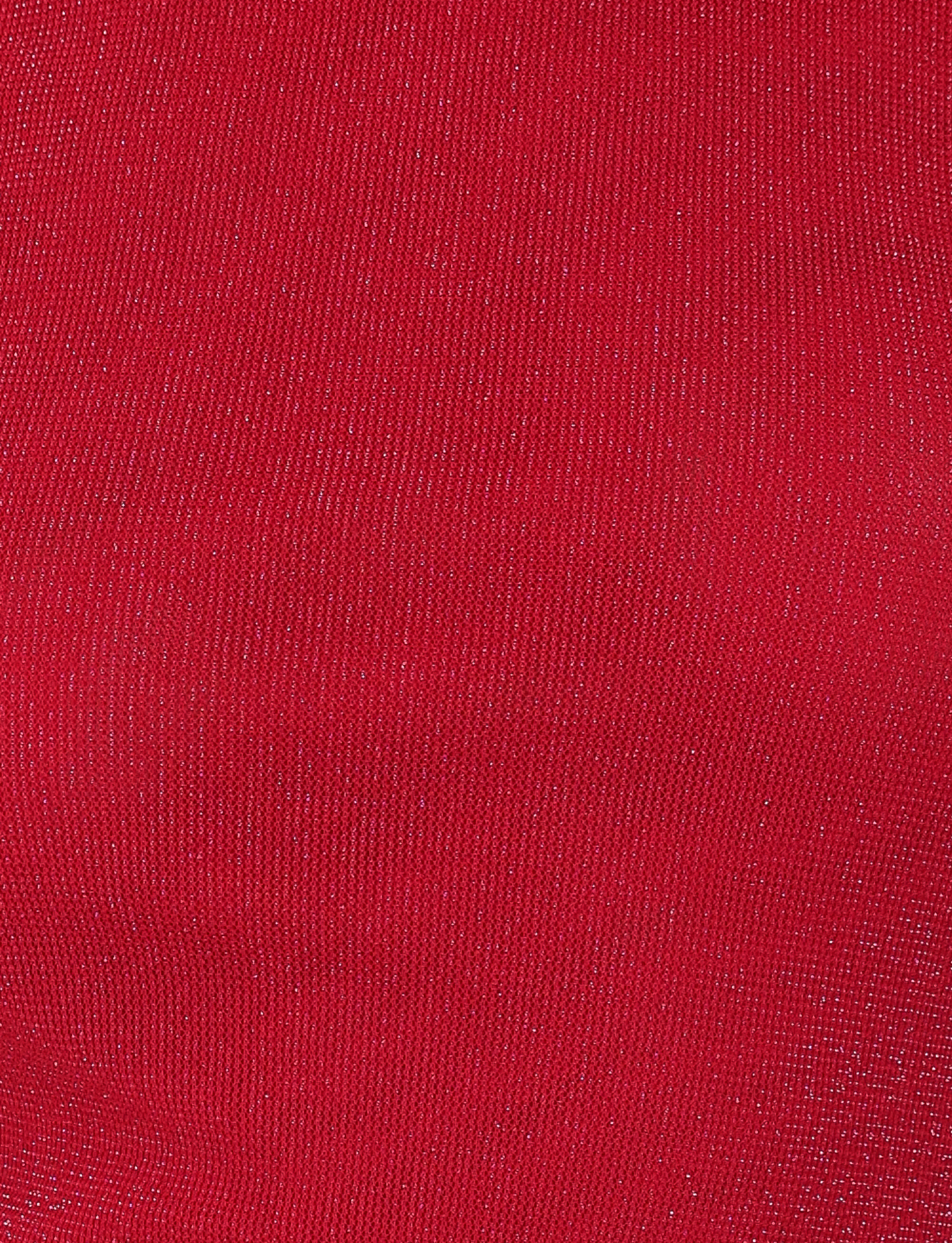 Close-up of the COBI TANK - RED : SPARKLE by TIGERMIST, featuring textured red shimmer jersey with fine lines and reflective threads—a stylish choice for a bold, elevated look.