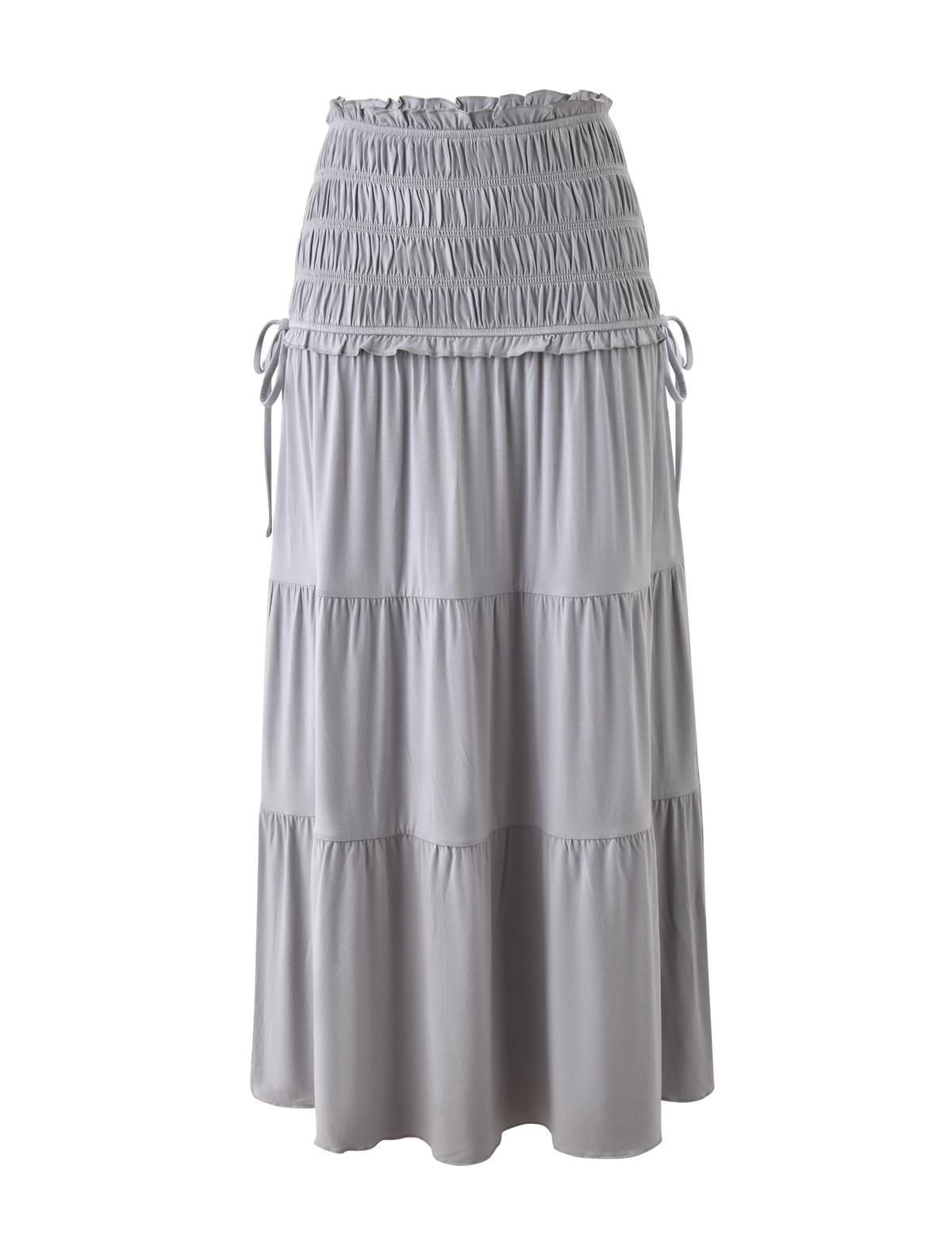The TIGERMIST DENALI MAXI SKIRT in Dove Grey features soft modal fabric, a shirred elastic waistband with drawstring ties, and gathered, tiered layers for a flowy look. Shown against a plain white background.