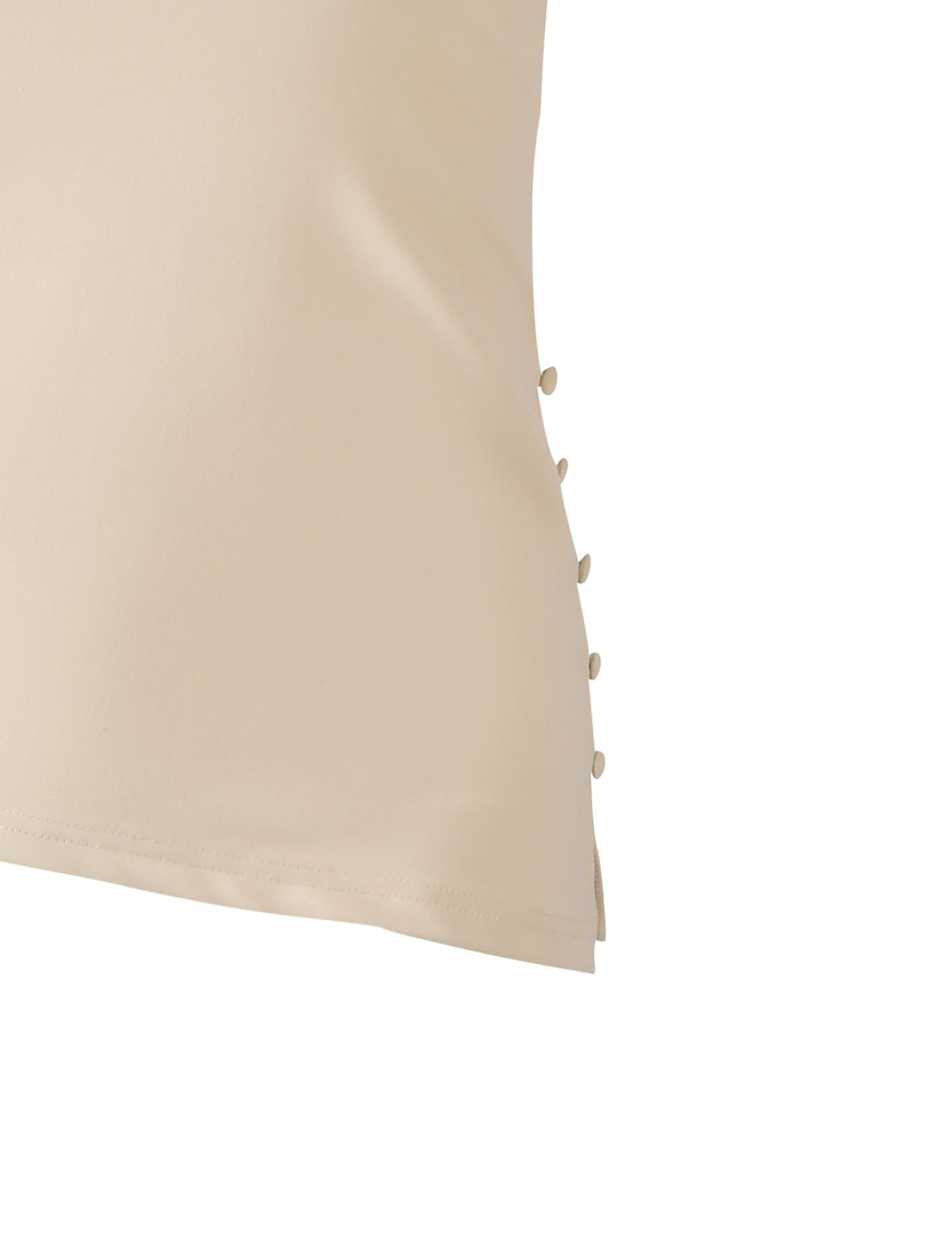 Close-up of the INDIRA TOP - CREAM by TIGERMIST, featuring a fitted strapless silhouette with small fabric-covered buttons along the side seam against a white background.