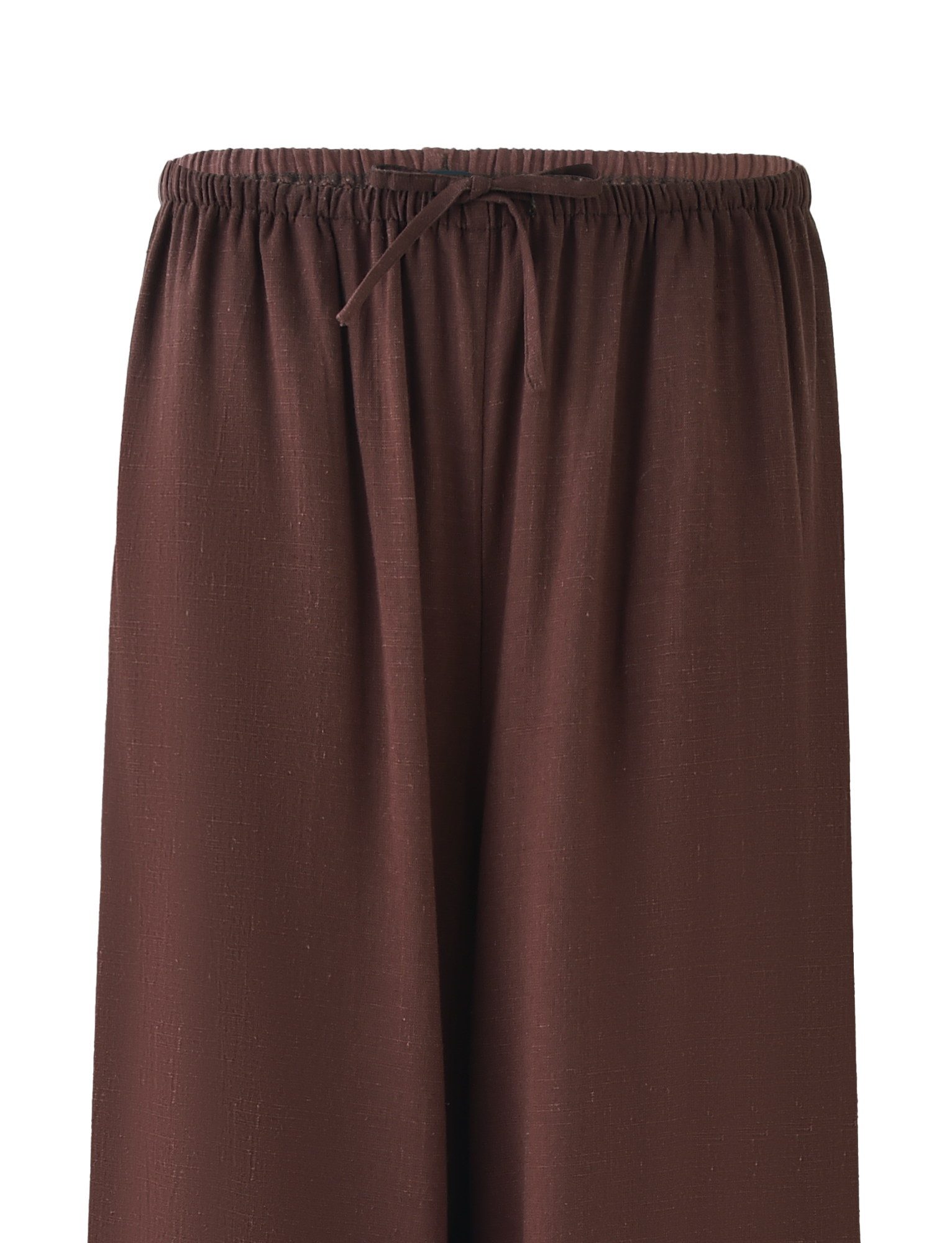 The LAINEY PANT - CHOCOLATE by TIGERMIST features wide-leg, textured brown linen, a mid-rise elastic waist with drawstring, and functional side seam pockets. Pants shown from waist down, no visible background.