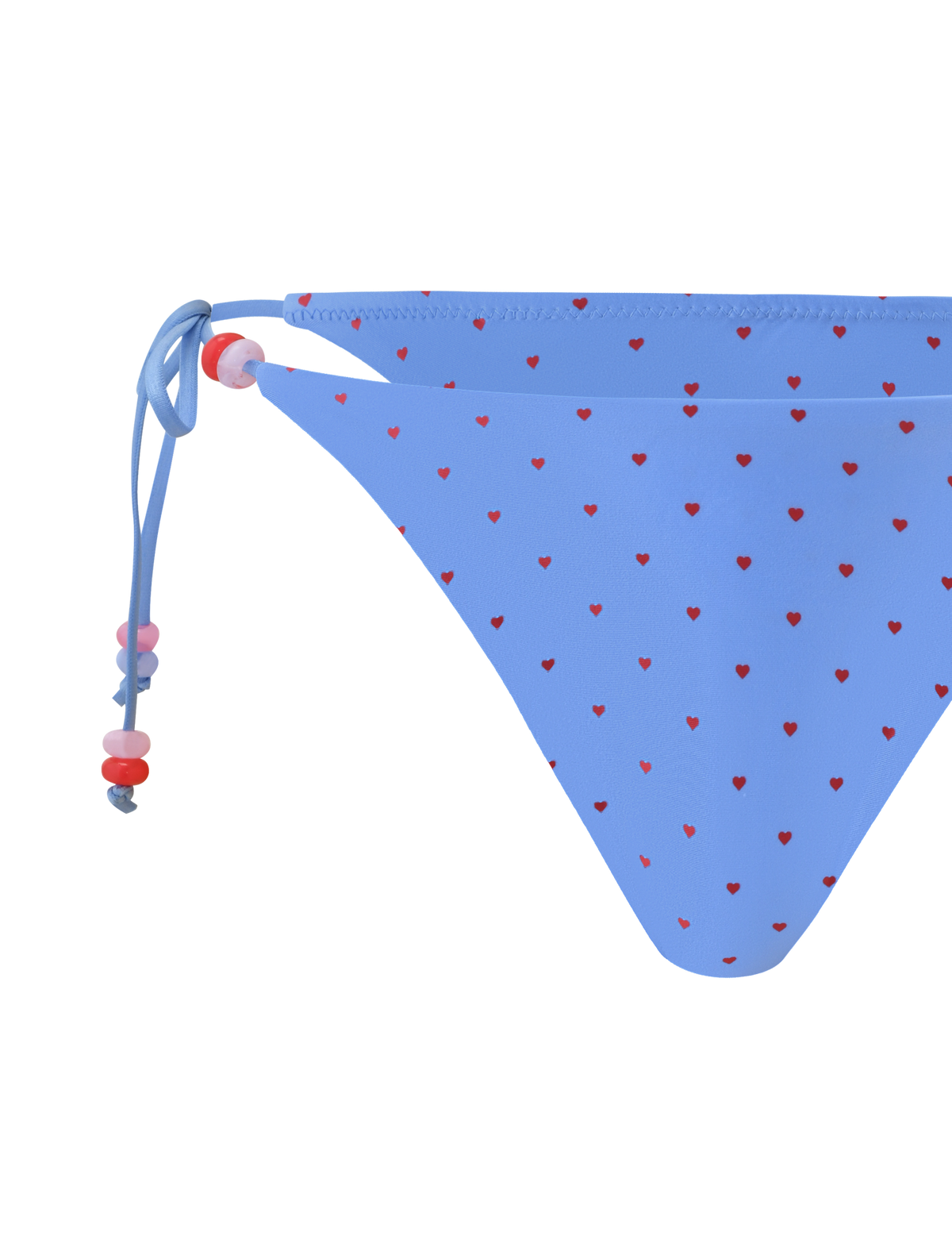 Close-up of the TIGERMIST FINLEA BIKINI BOTTOM - BLUE HEART POLKA DOT in a cheeky cut, featuring blue polka dot hearts with small red hearts and adjustable side ties with pink, red, and white beads. Set against a plain white background.