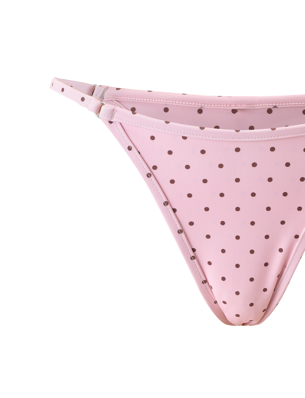 Close-up of the TIGERMIST DIANA SWIM SKIRT SET in pink polka dot, featuring playful detailing, shown against a plain white background.