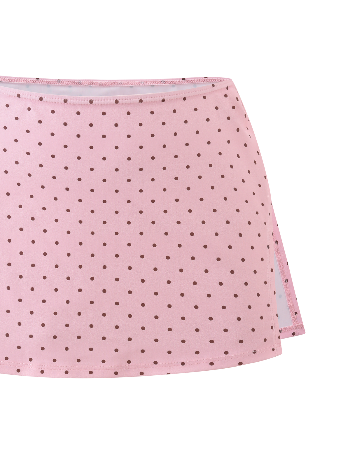 The TIGERMIST DIANA SWIM SKIRT SET in pink polka dot features a side slit and a pattern of small brown dots on a white background.