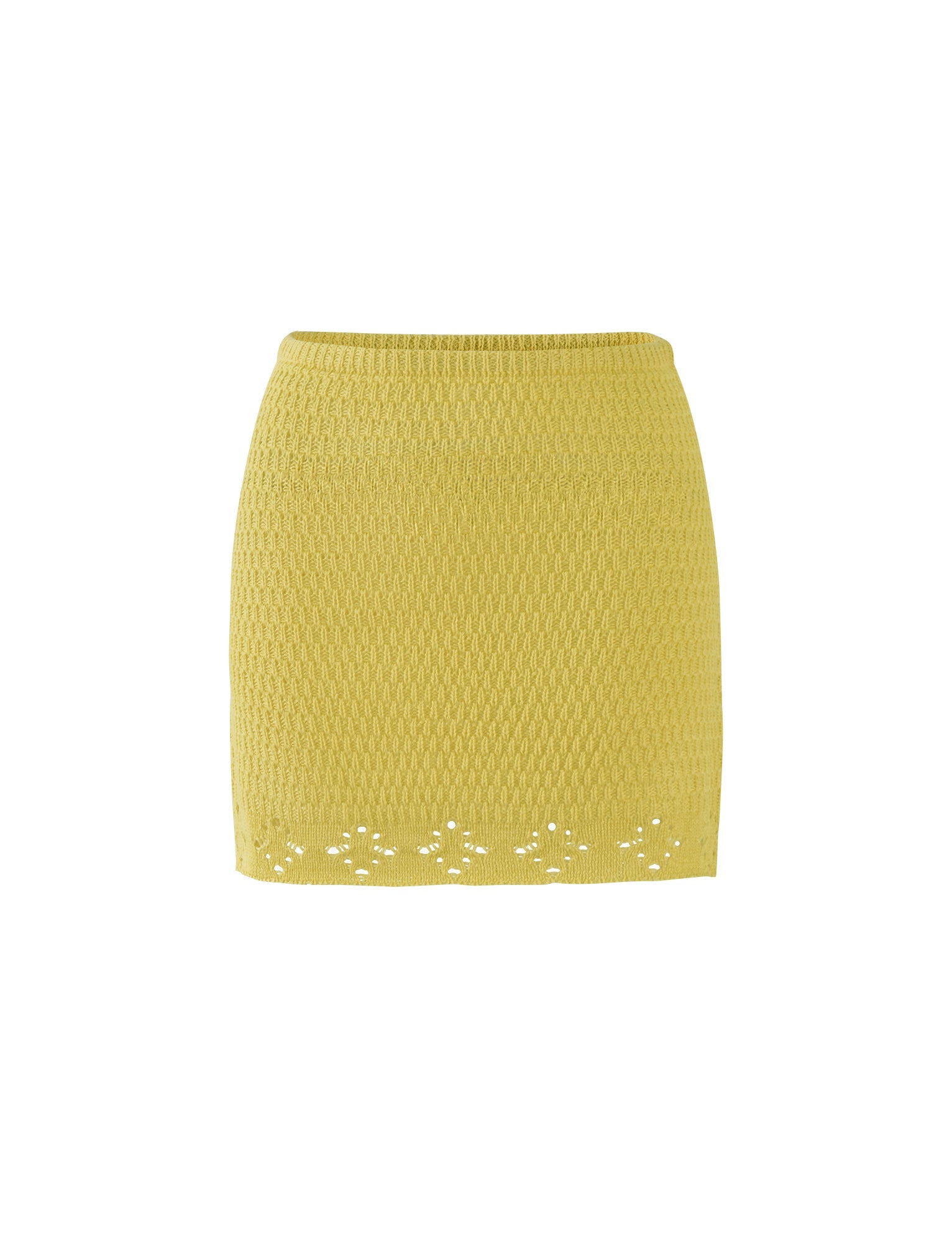 The JANAI SKIRT - YELLOW: LEMON from TIGERMIST is a yellow, textured knit skirt with a slightly tapered silhouette. It features a small, delicate floral cutout pattern along the hemline. The design is simple and elegant, with no visible buttons or zippers. The fabric has a subtle woven texture.