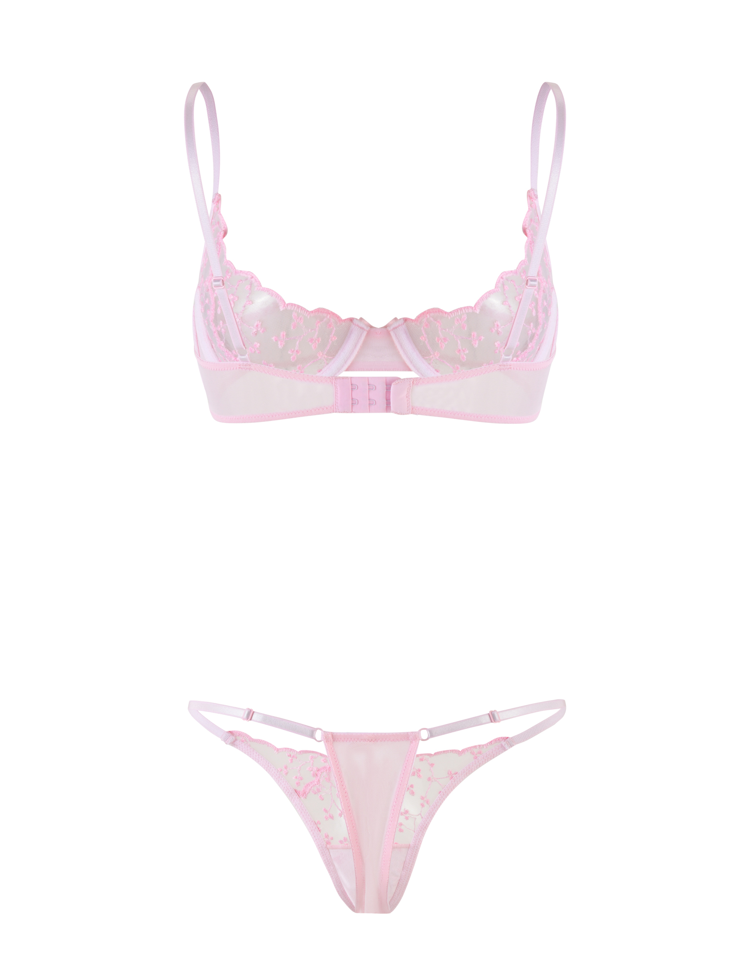 The TALIYAH SET - PINK : BABY PINK by TIGERMIST includes a sheer lace bra and matching g-string with floral embroidery and delicate straps, shown against a white background.