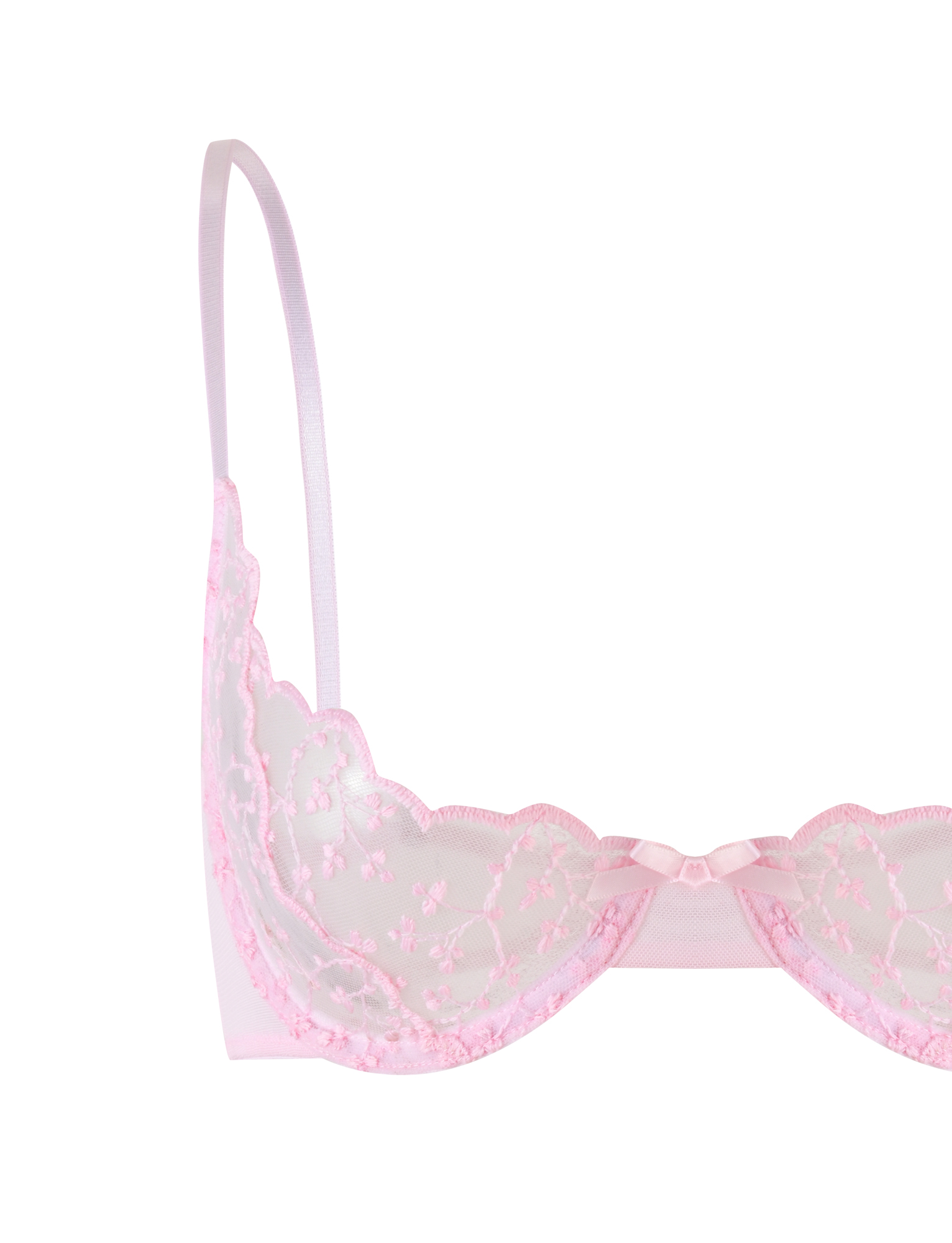 The TIGERMIST TALIYAH SET in baby pink features a lace bra with sheer floral embroidery, underwire cups, thin straps, and a center bow. Pair with the matching g-string for a delicate lingerie look.