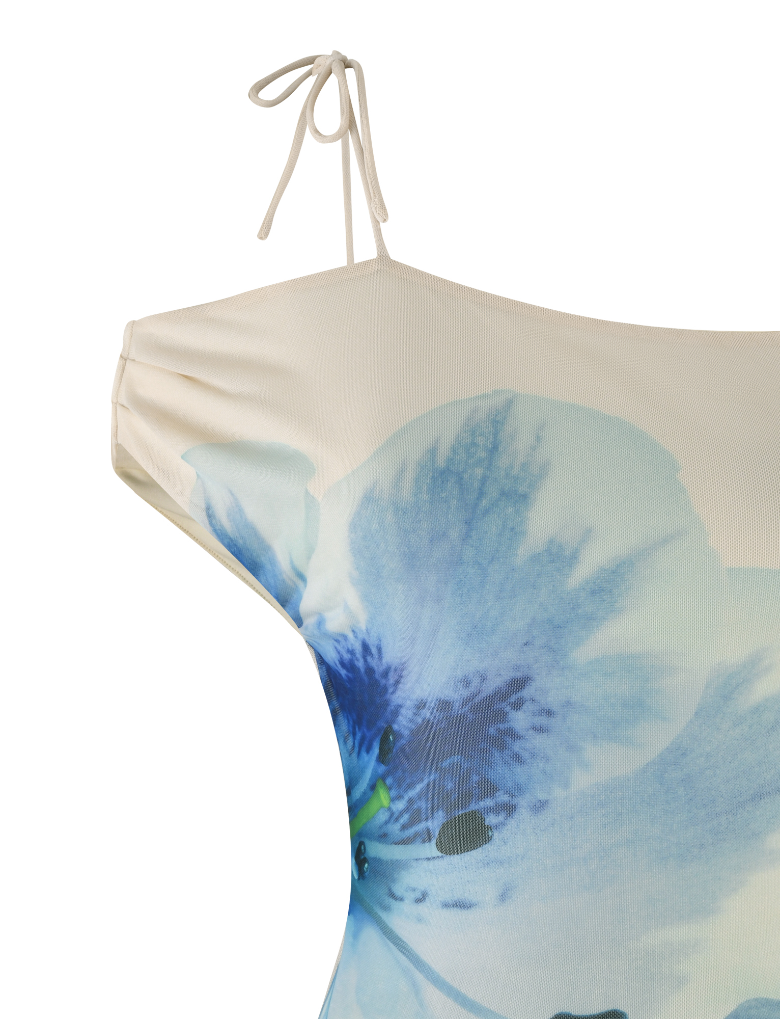 Close-up of the LILLIAN TOP by TIGERMIST in cream with a blue floral print, featuring an off-shoulder design and a thin strap tied in a bow.
