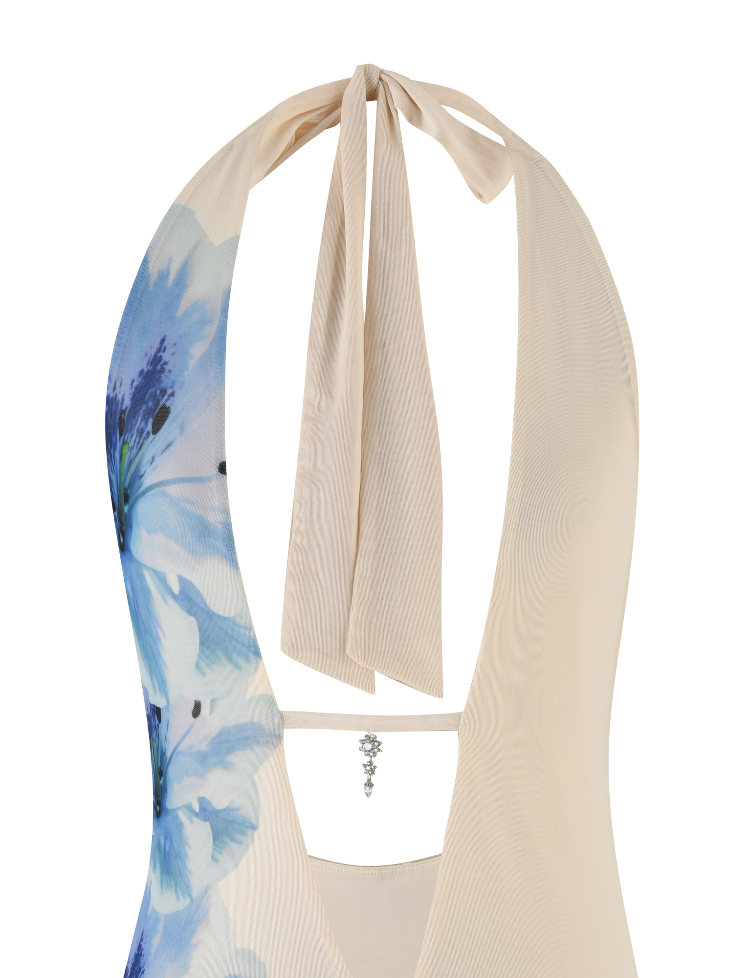 A close-up of the back of the TIGERMIST BROOKS DRESS in cream with a blue floral print, showcasing a plunging neckline, deep V-back, neck tie, and delicate beaded detail along the lower back.