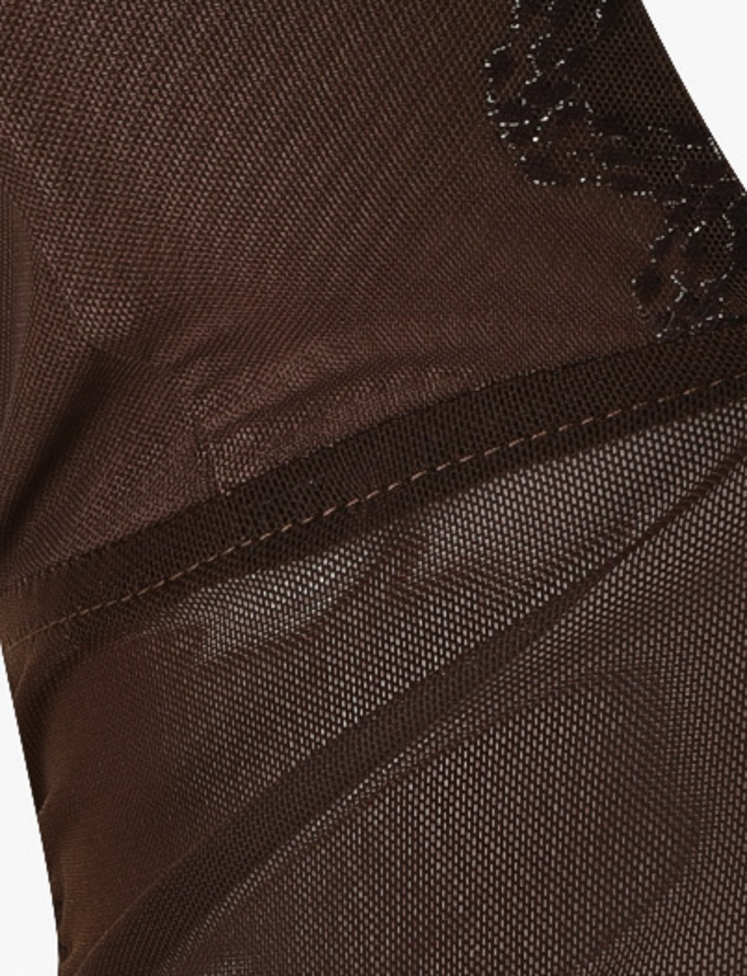 Close-up of the TIGERMIST BRESILY TOP - BROWN : CHOCOLATE reveals detailed mesh texture, visible stitching, and overlaying seams, highlighting the intricate design of this stylish brown halter top.