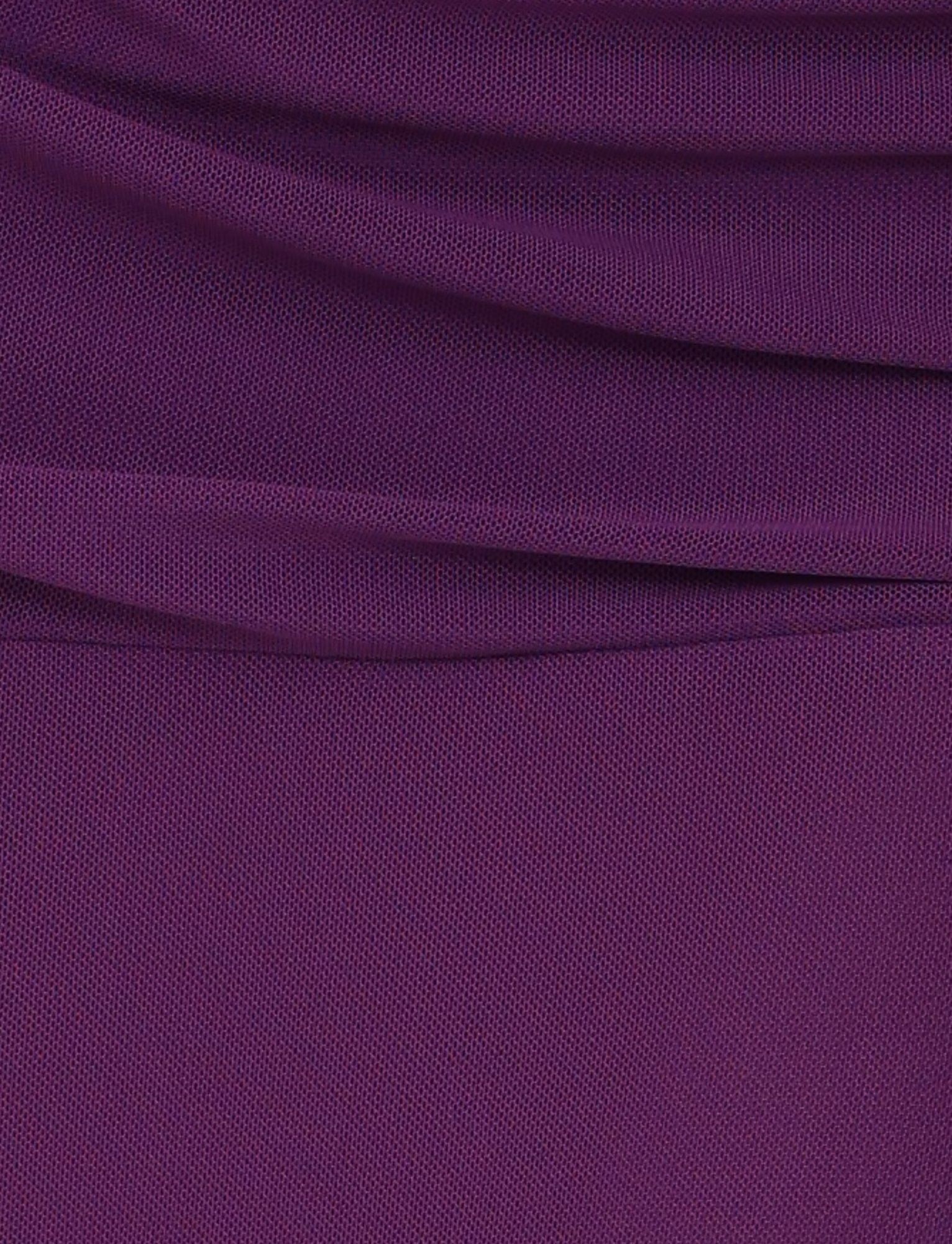 Close-up of the TIGERMIST MARIANA SKIRT - PURPLE fabric, highlighting its textured, smooth, and slightly shiny surface with gentle folds—ideal for an elegant midi look.