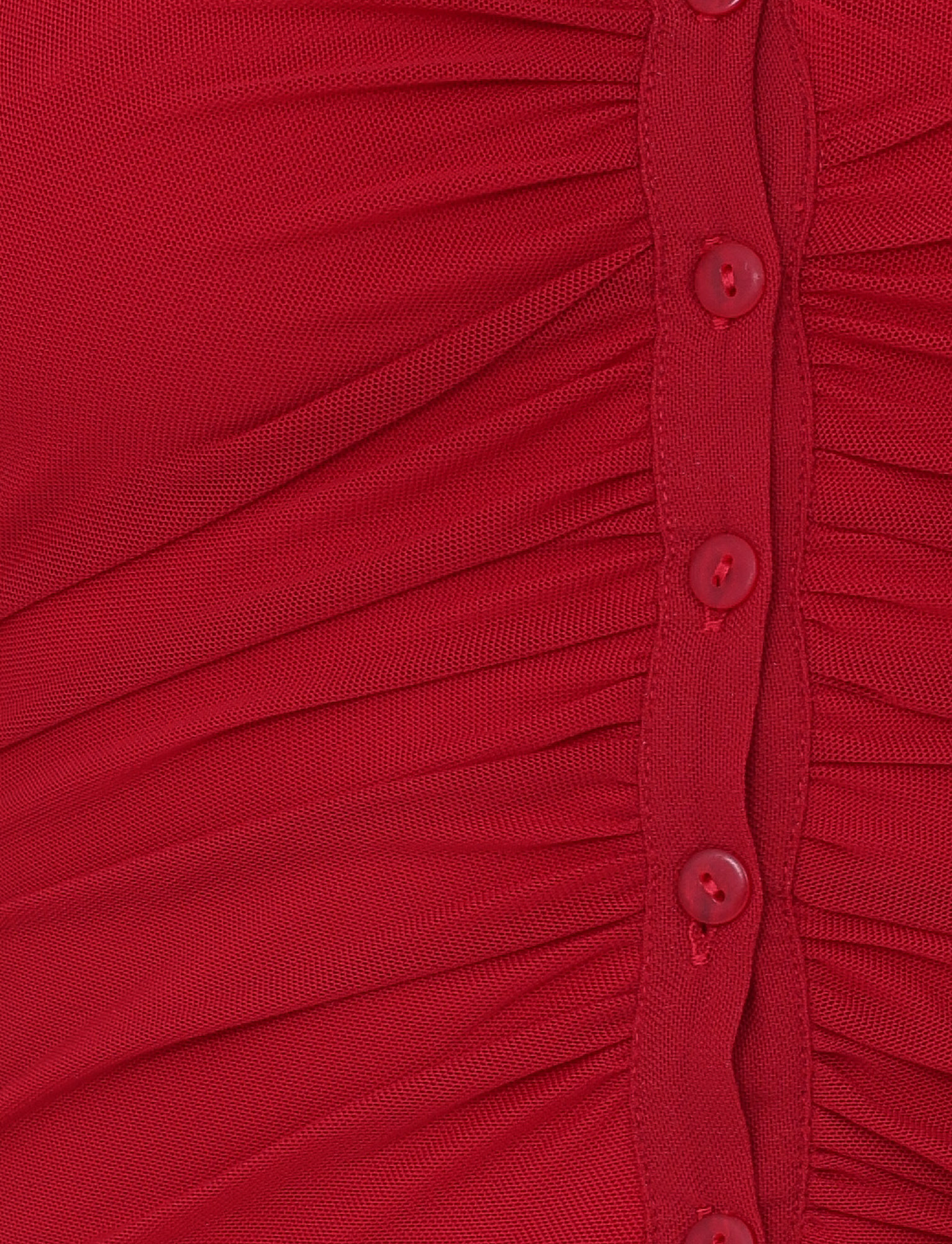 Close-up of the TIGERMIST ZAFIRA TOP in red, featuring gathered ruched fabric and a central row of small red buttons for a placket-inspired look.