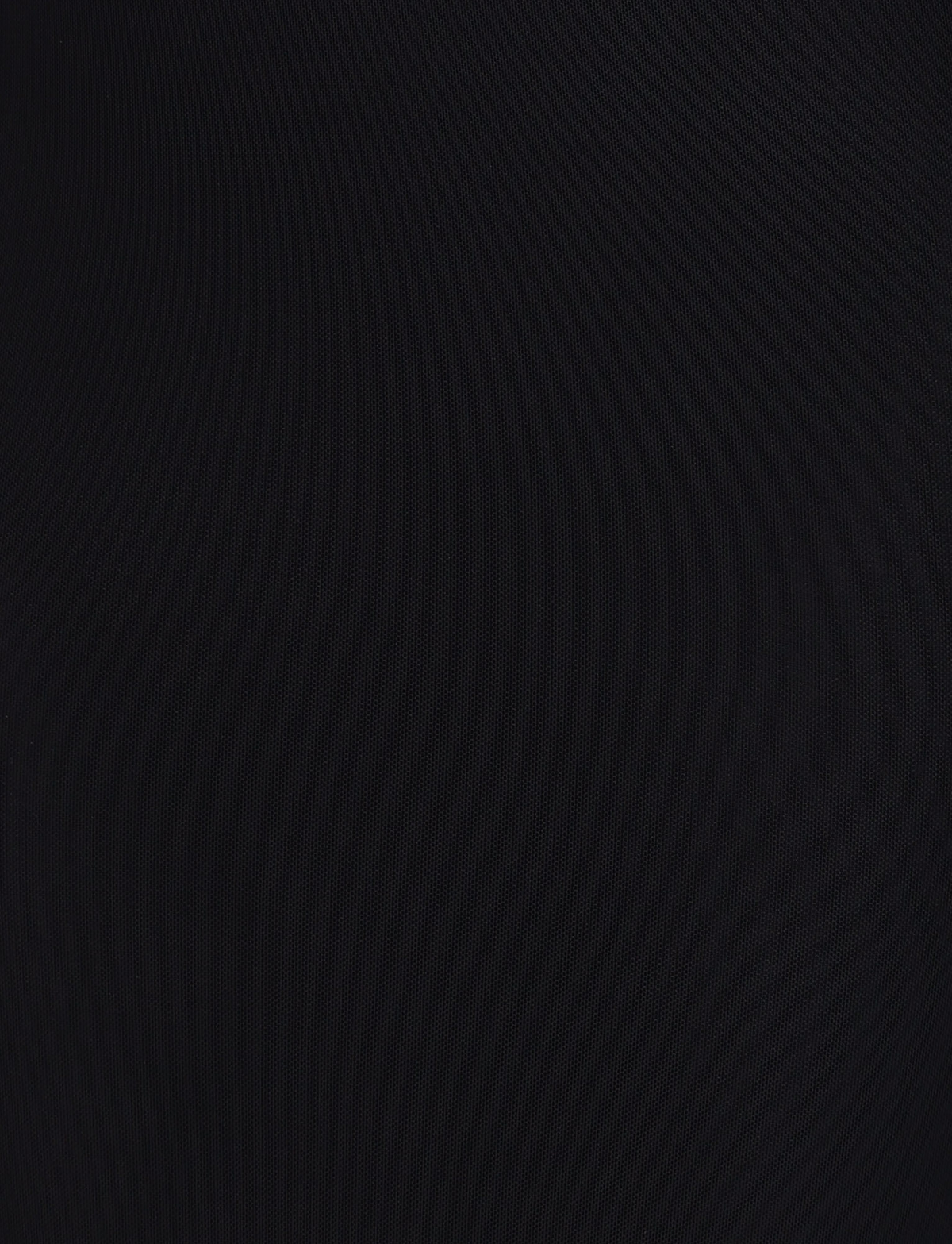 A plain black background with a subtle, faint texture reminiscent of the delicate finish of the TIGERMIST ZARA MAXI DRESS - BLACK.