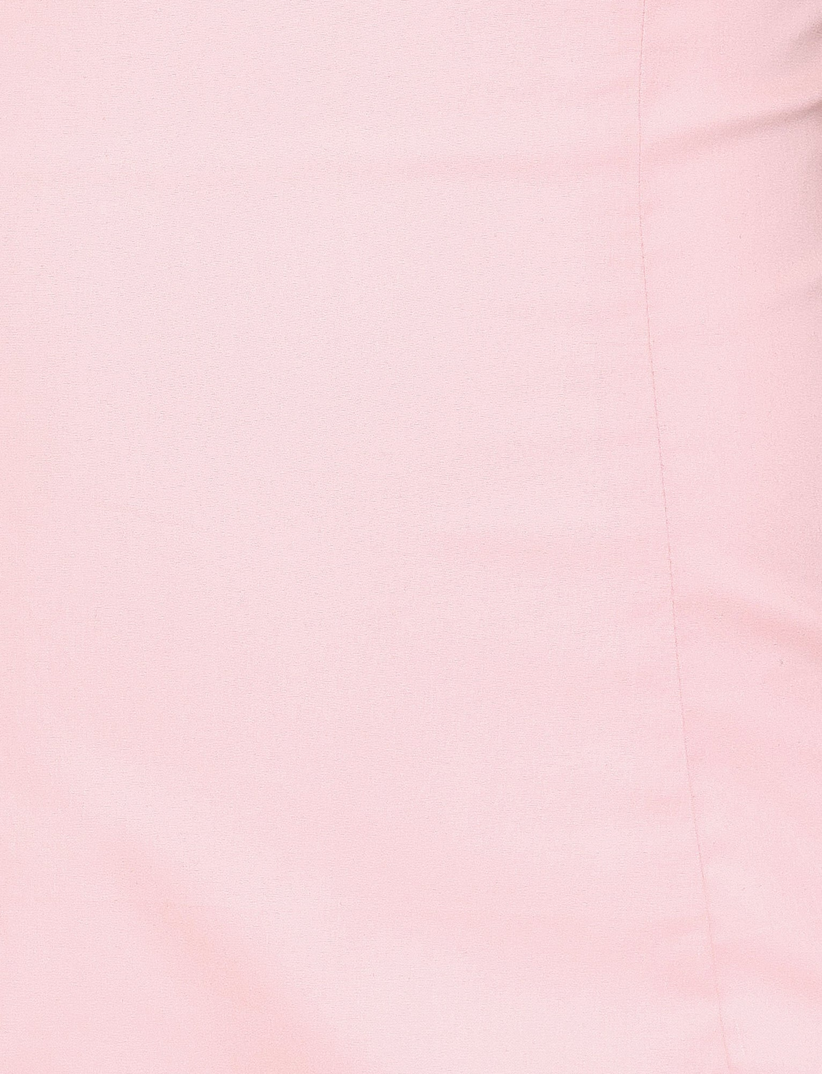 A close-up of the TIGERMIST COLSON MINI DRESS in Baby Pink shows smooth, light pink fabric with a vertical seam on the right and subtle shading.
