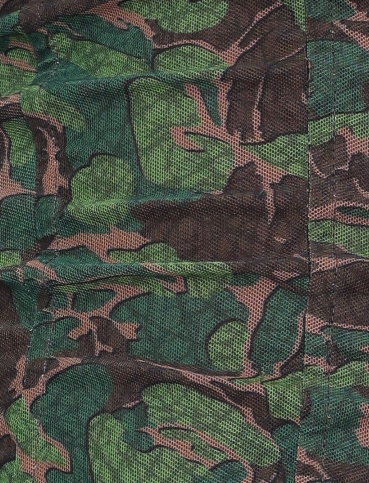 Close-up of the TIGERMIST DULCE CORSET - GREEN : CAMO, featuring green, brown, and black camouflage fabric with visible stitching and textured weave—perfect for a uniquely shaped bust.