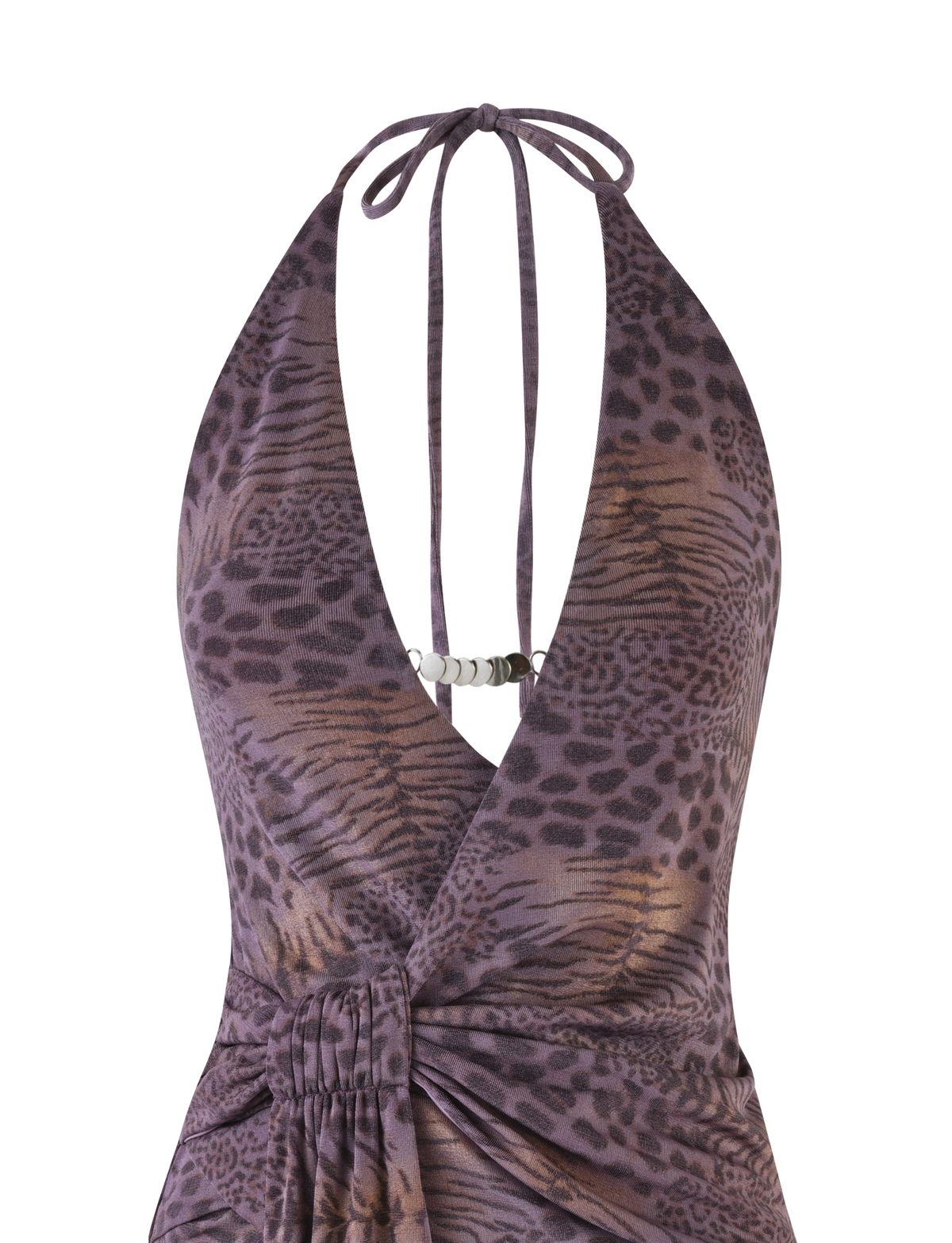 Close-up of the INDIGO MINI DRESS - PURPLE TIGER by TIGERMIST, a halter-neck mini dress featuring a deep V-neck, purple and brown tiger print, metallic chest detail, high-stretch fabric, and ruched waist for a flattering fit.