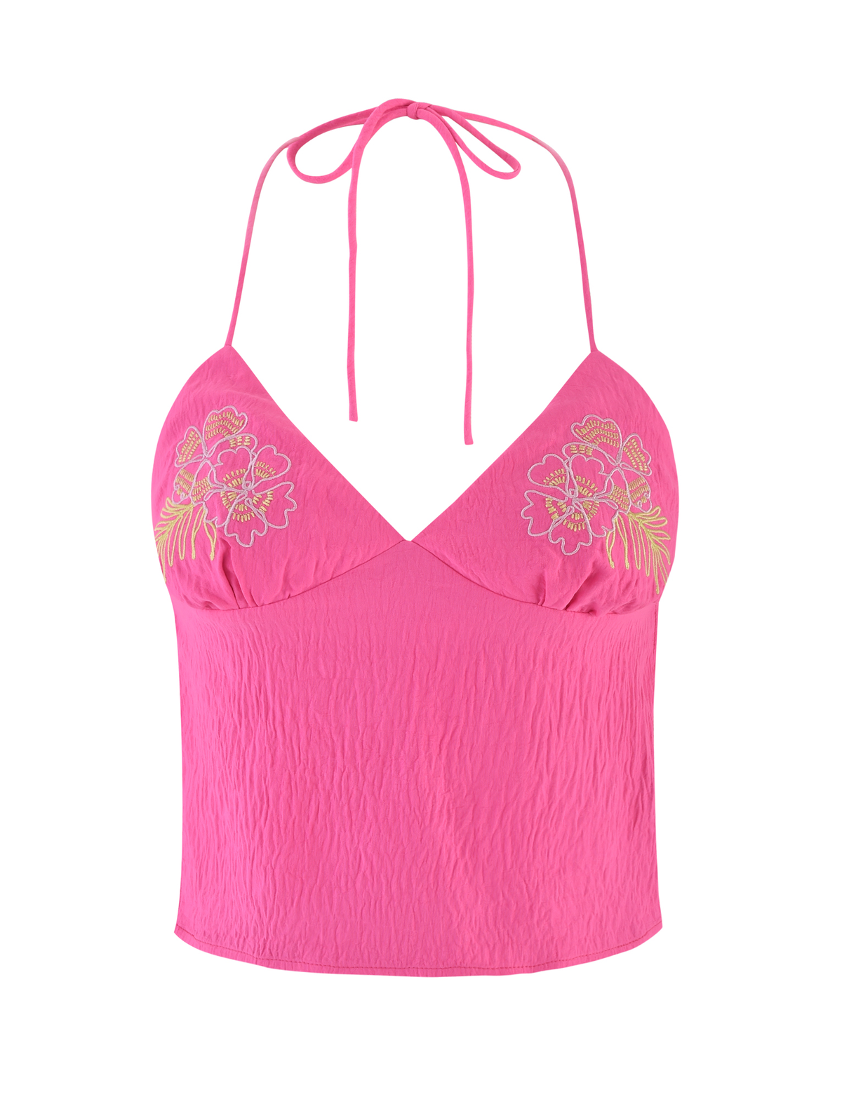 The KAELAH TOP by TIGERMIST is a hot pink halter with an open back, thin straps, floral embroidery on each chest side, and a slightly crinkled fabric texture.