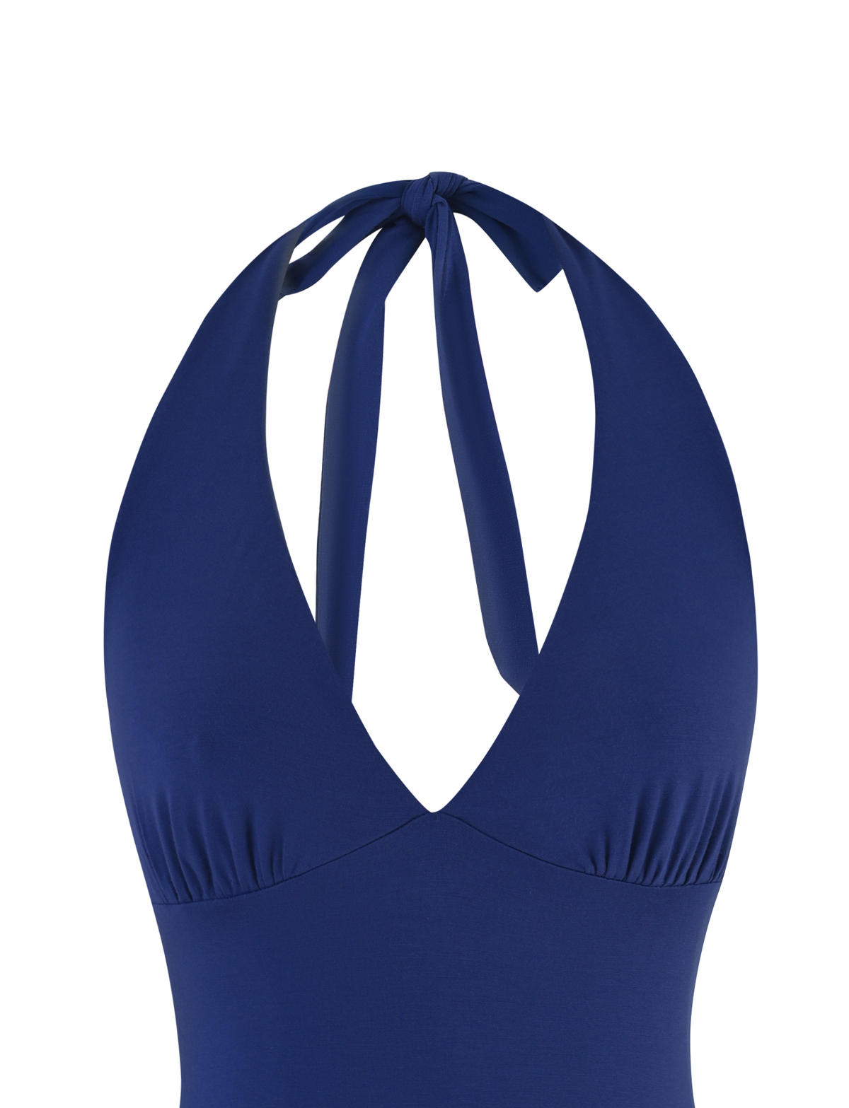 A close-up of the TIGERMIST MERIAL TOP in denim blue shows a fitted halter swimsuit with a plunging V-neckline, tie neck, and gentle gathers under the bust for a smooth, flattering fit.