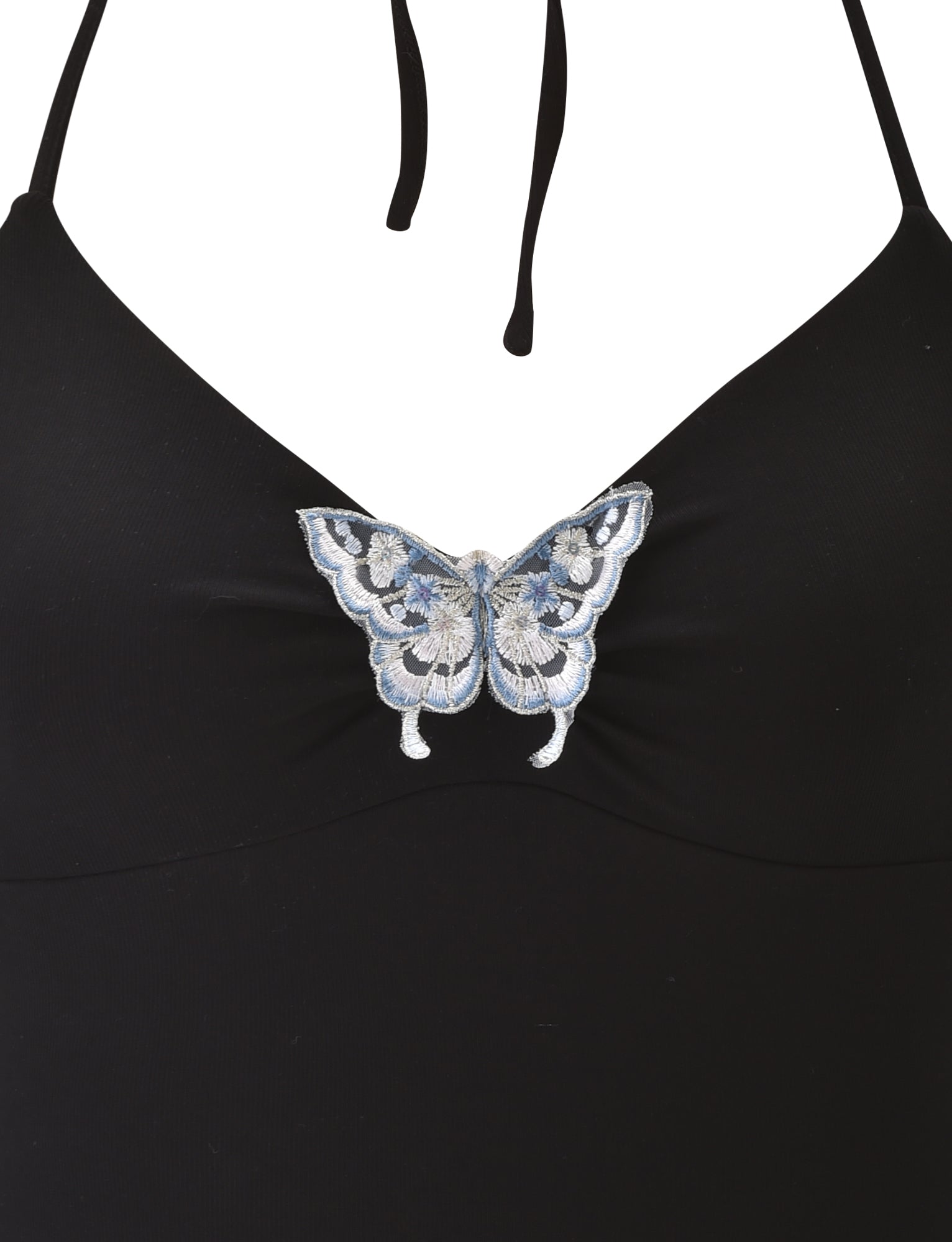 Close-up of the CELESTINE TOP in black by TIGERMIST, featuring a fitted halter style with an embroidered blue and white butterfly at the center of the chest.