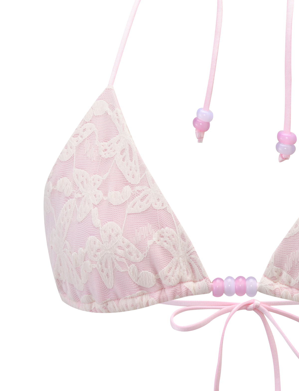 The BRIGITTE BIKINI TOP by TIGERMIST features an ivory lace overlay, beaded straps, an adjustable halter neck tie, and a small center bow for a delicate look.
