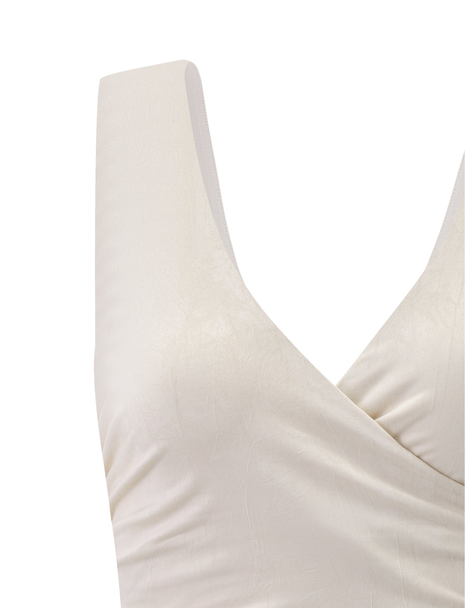 Close-up of the TIGERMIST NURA TOP - IVORY, showcasing a sleeveless design, V-neckline, and subtle fabric texture.