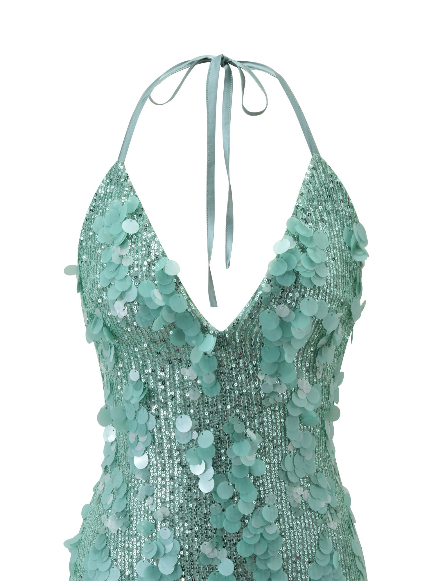 A close-up of the ZANA MINI DRESS in mint by TIGERMIST, featuring a halter neck, deep V-neckline, and large shiny sequin embellishments with round appliqués.