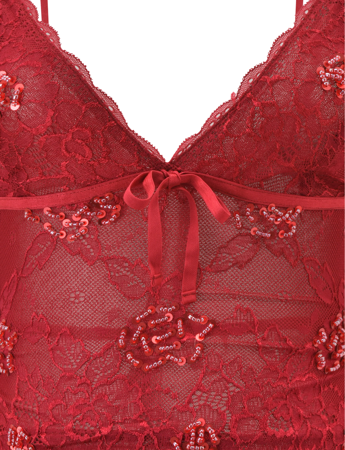 Close-up of the TIGERMIST KIRRA BEADED SEQUIN LACE TOP in red, featuring floral lace, bead and sequin embellishments, a sheer mesh panel, and a small satin bow at the center front.
