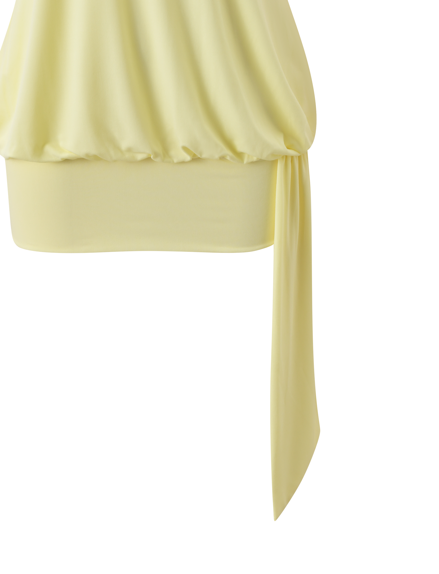 A close-up of the TIGERMIST RAVENNA MINI DRESS in butter yellow, styled next to a light yellow, sleeveless blouse with a gathered hem and draped side tie, both set against a white background.