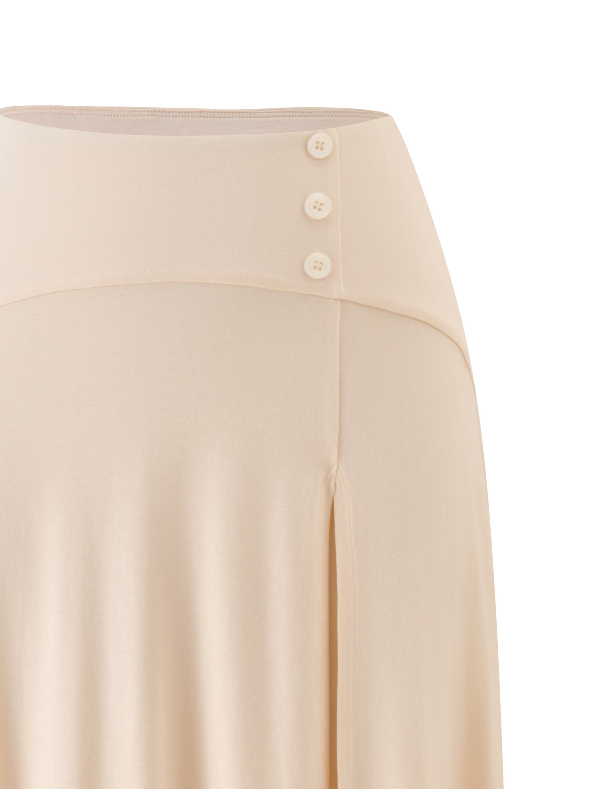 Close-up of the TIGERMIST ALYSSA HI LO SKIRT in cream, featuring three buttons on the waistband and soft, flowing fabric.