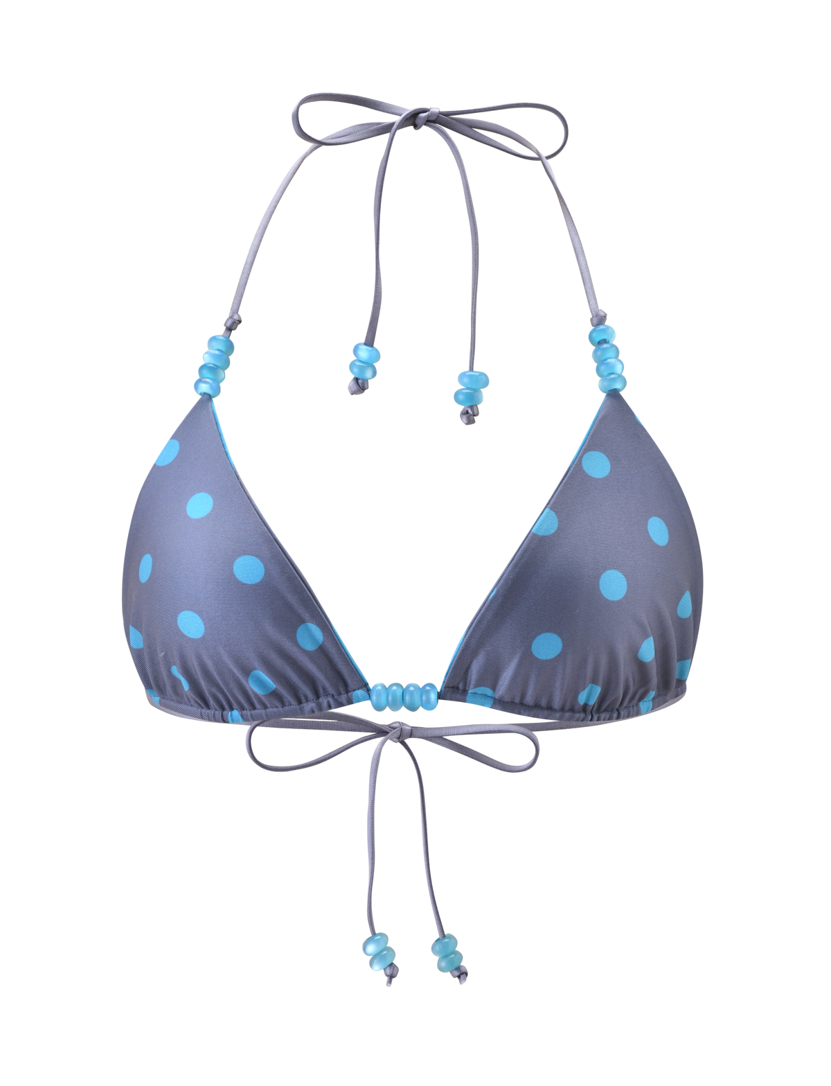 The FINLEA Reversible Bikini Top by TIGERMIST features a blue-grey dot and stripe design with an adjustable halter neck and back ties.