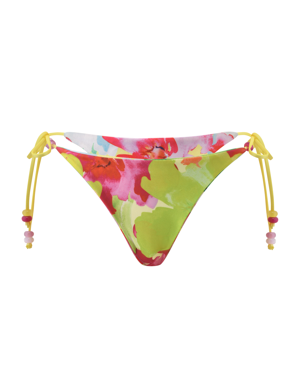 The TIGERMIST FINLEA REVERSIBLE BIKINI BOTTOM in Garden Daiquiri Floral features a vibrant red, pink, green, and yellow floral pattern with yellow string ties on the sides, each decorated with pink and yellow beads.