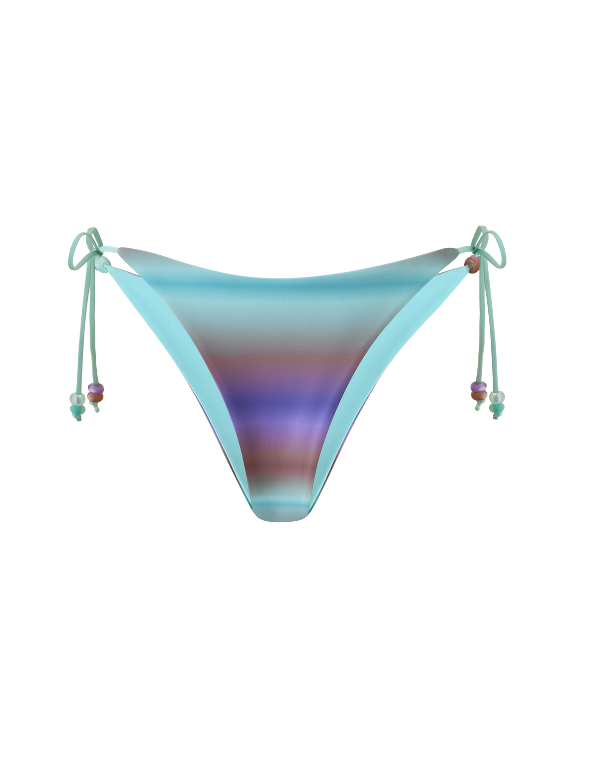 The REVERSIBLE FINLEA BIKINI BOTTOM - MERMAID OMBRE STRIPE by TIGERMIST features a cheeky bikini cut with gradient blue, purple, and teal shades accented by beaded side ties, shown on a plain white background.