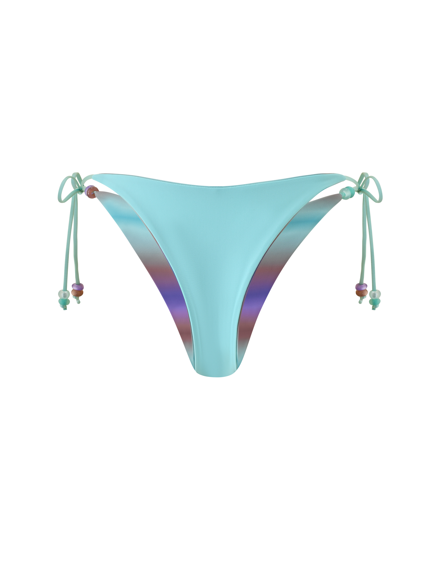 The TIGERMIST REVERSIBLE FINLEA BIKINI BOTTOM - MERMAID OMBRE STRIPE features a light blue hue with adjustable side tie closures adorned with beaded accents. Designed in a cheeky cut, these bikini bottoms are reversible, showcasing a striking purple-toned ombre stripe lining on the interior for versatile styling against a solid light gray background.