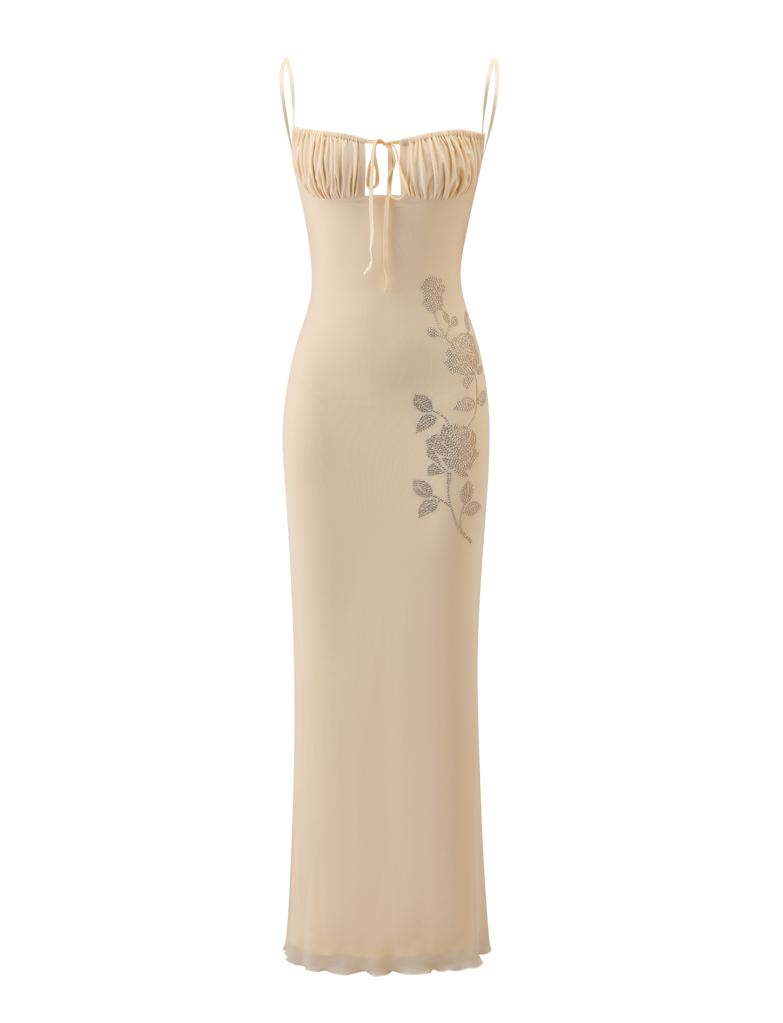 The OPHELIA MAXI DRESS by TIGERMIST features a cream hue, adjustable spaghetti straps, a gathered bust with a dainty bow, and delicate floral detailing along one side.