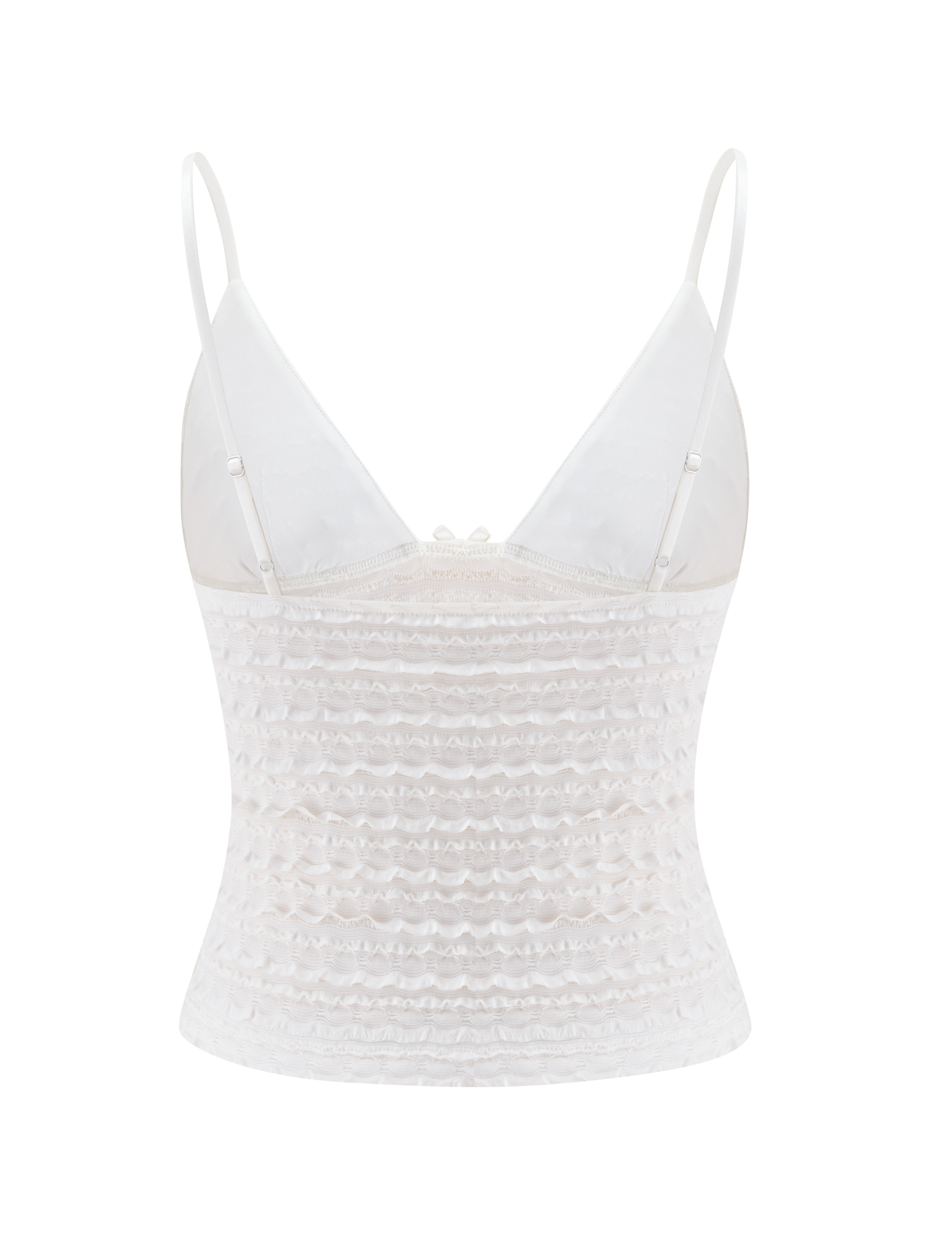 The ZORA TOP - CREAM by TIGERMIST features adjustable straps, a fitted ruched bodice, and sheer textured fabric with ruffle detailing—perfect for layering or wearing solo.