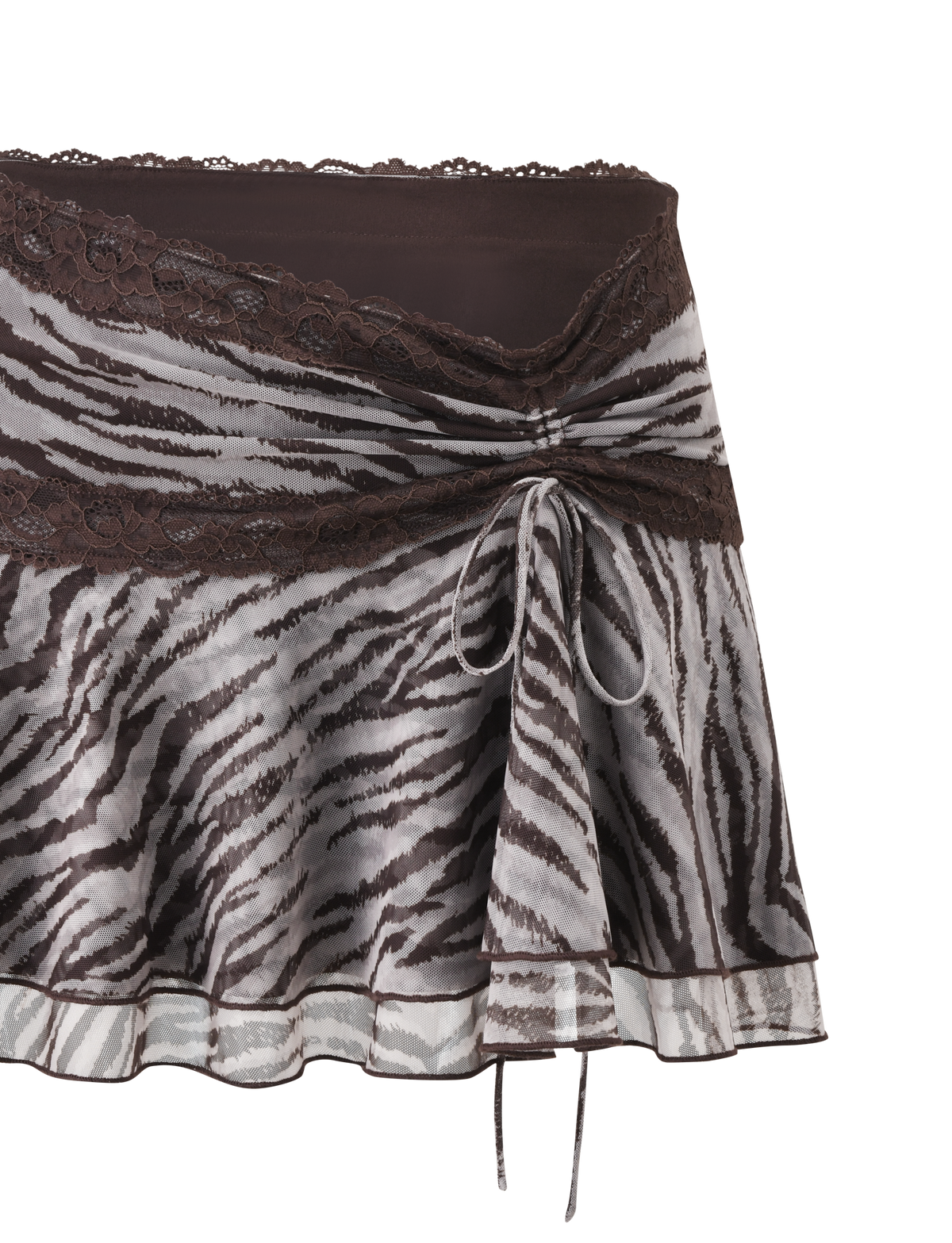 The VIRA MINI SKIRT - NEUTRAL ZEBRA by TIGERMIST features a brown and white zebra print, lace trim at the waist and hem, a front center bow, and a double-tiered ruffle design for added style.