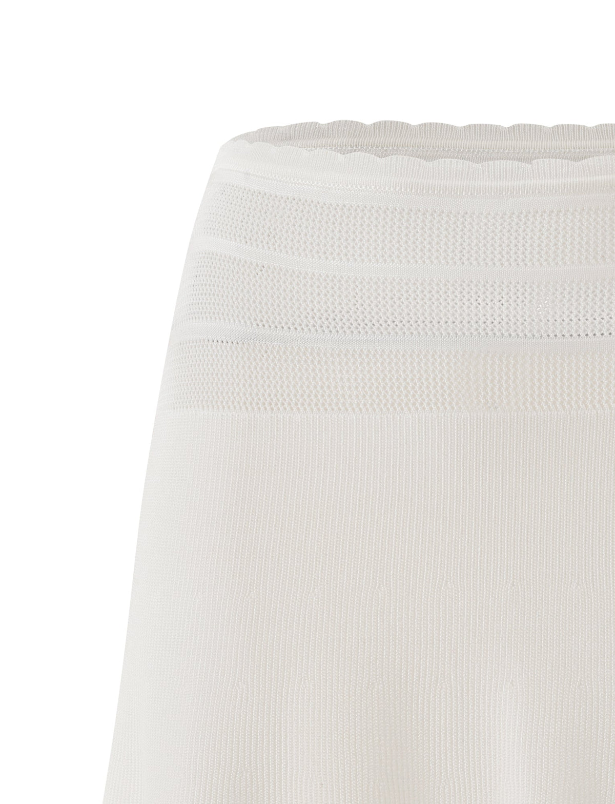 Close-up of the DENI MINI SKIRT in cream by TIGERMIST, featuring textured patterns with horizontal mesh-like stripes and subtle ribbing near the waistband. The A-line silhouette creates a flattering look, making it an ideal summer skirt.