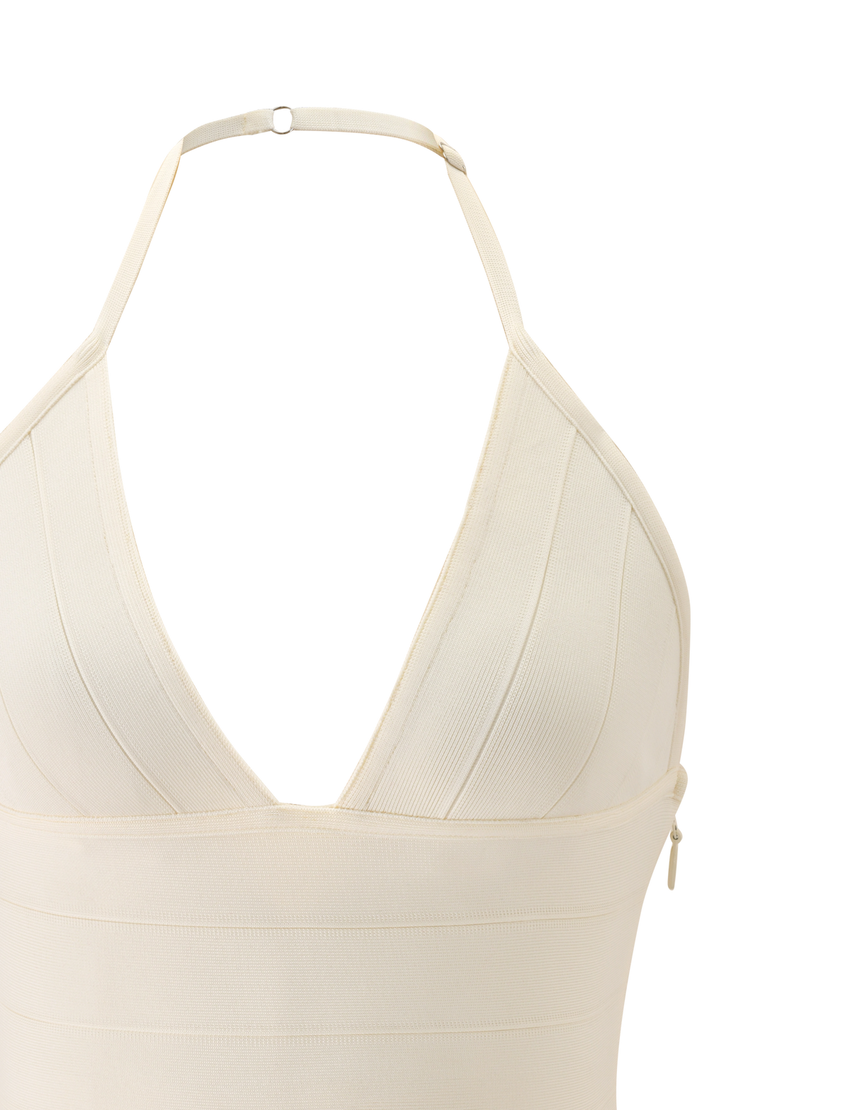 Close-up of the TIGERMIST NYX BANDAGE TOP in cream, featuring a halter neck, plunging triangle cups, visible stitching, adjustable neck strap with metal clasp, and thick structured fabric for a sculpted fit.