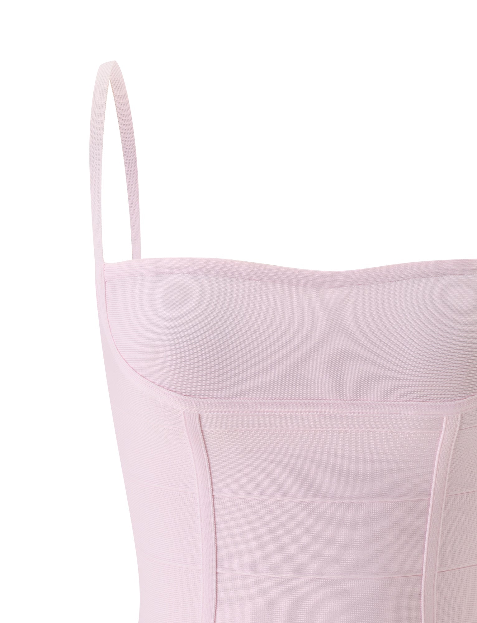 The TAHNIA BANDAGE TOP by TIGERMIST is a ballet pink, sleeveless top with thin shoulder straps and vertical seam detailing, showcasing a corset-style design for a flattering bodycon fit; pictured from the chest up against a white background.