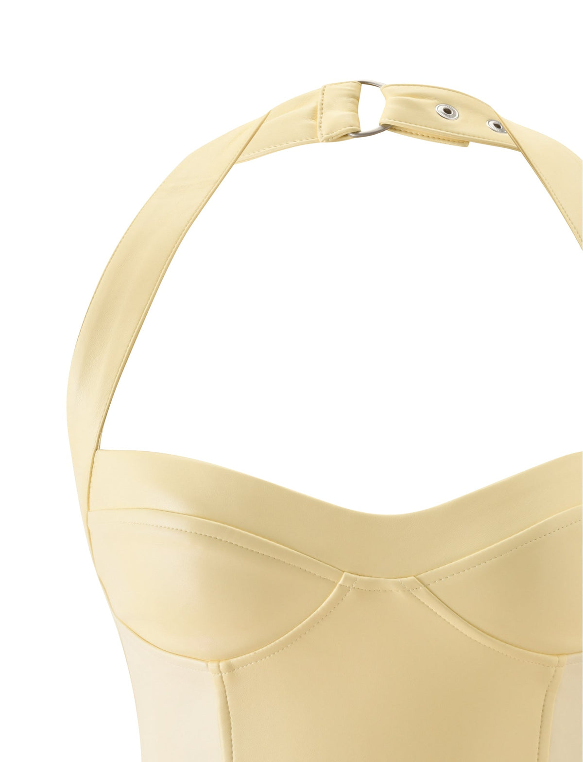 Close-up of the TIGERMIST EMERALD 2.0 TOP - BUTTER YELLOW, featuring butter yellow faux leather, a halter neck strap, snap button closure, and defined stitching against a white background.