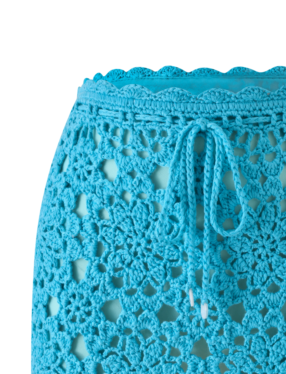 SASHA CROCHET MINI SKIRT - AQUA in aqua blue featuring a scalloped waistband and a drawstring tie.