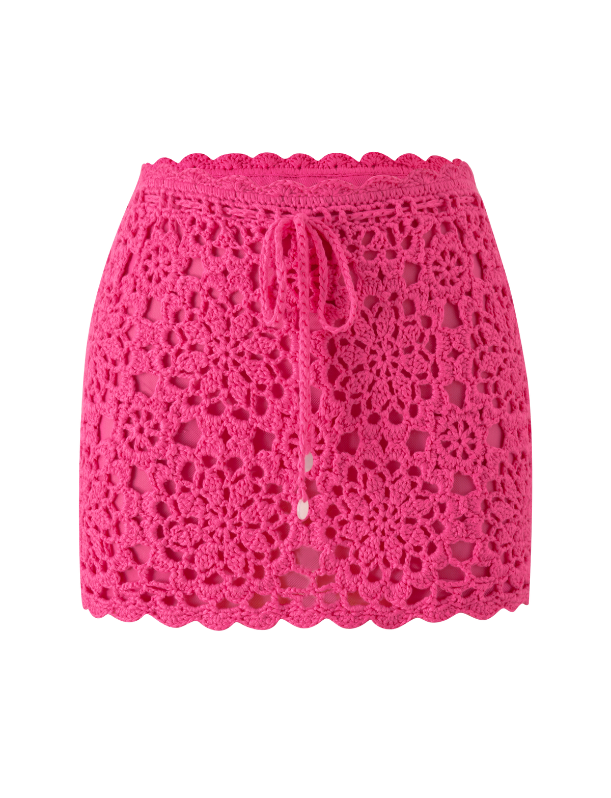 The SASHA CROCHET MINI SKIRT - HOT PINK by TIGERMIST features a scalloped hem and drawstring waist, making it the perfect vacation staple.