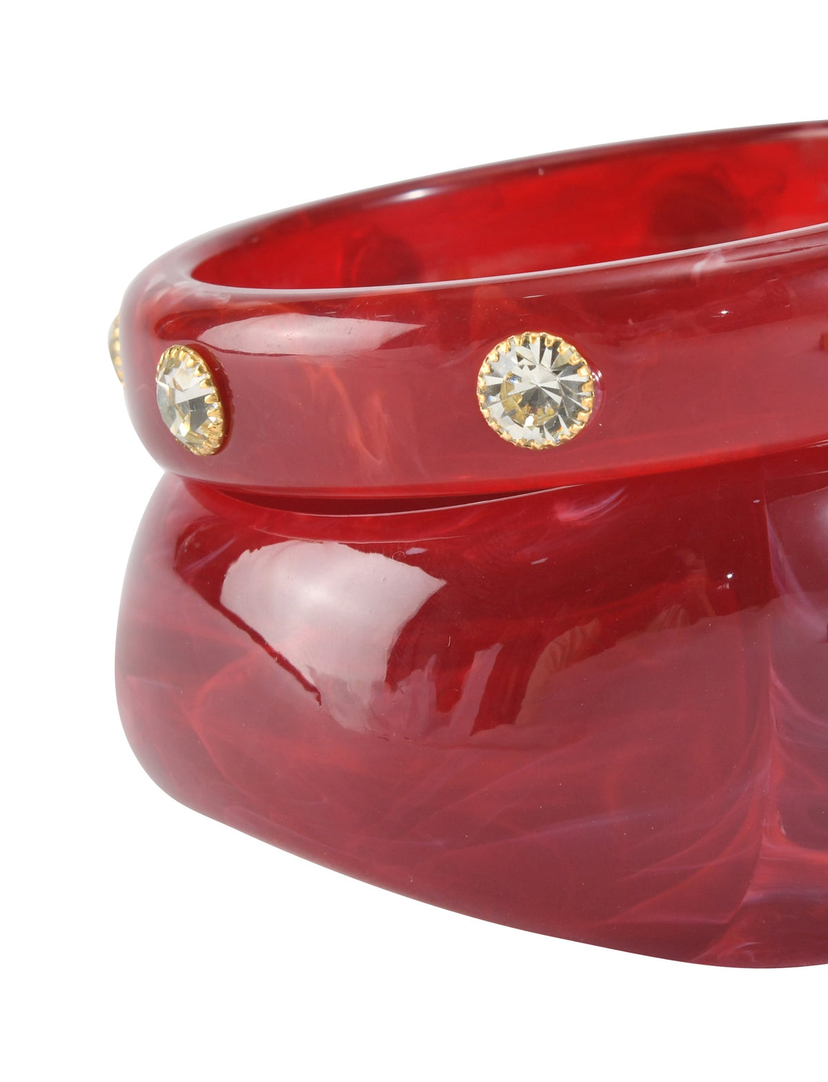 The COLE BANGLE SET - DEEP RED by TIGERMIST features two glossy red acrylic bangles, one accented with rhinestones, stacked together on a white background.