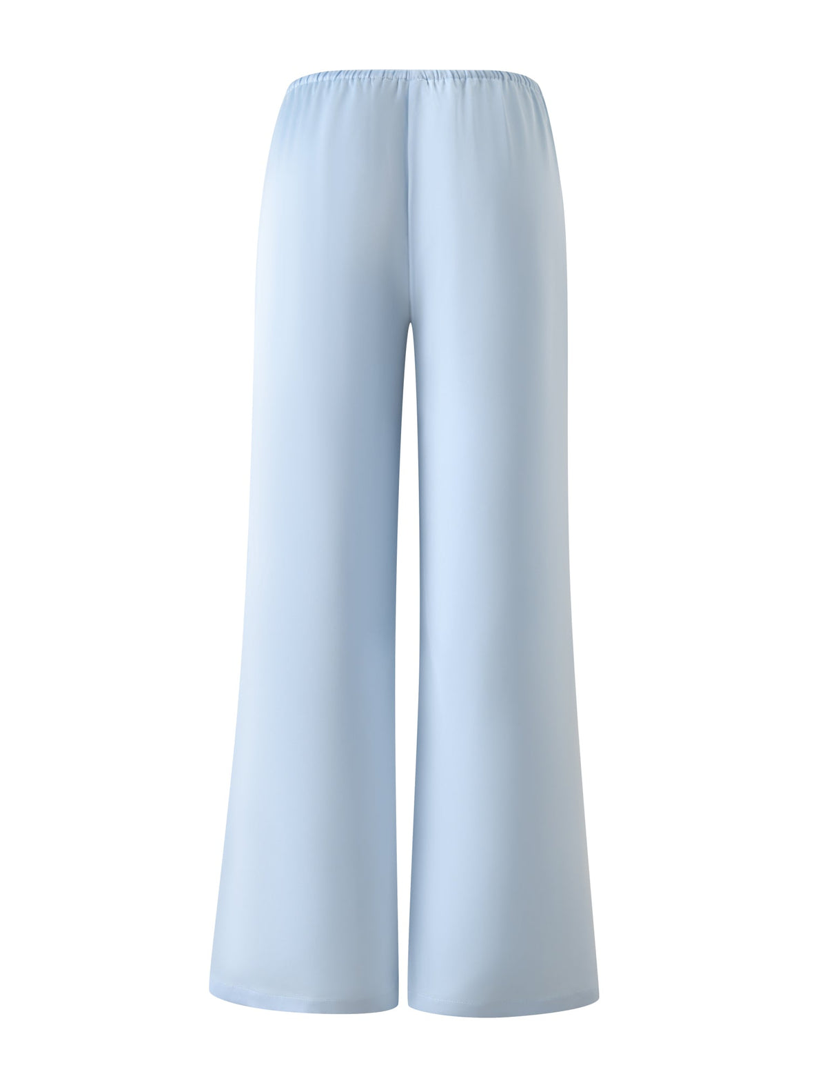 The MAURA PANT - SKY by TIGERMIST features a light blue, high-waisted, wide-leg satin design with an adjustable drawstring and elastic waistband. Smooth and flowy fabric shown against a white background.