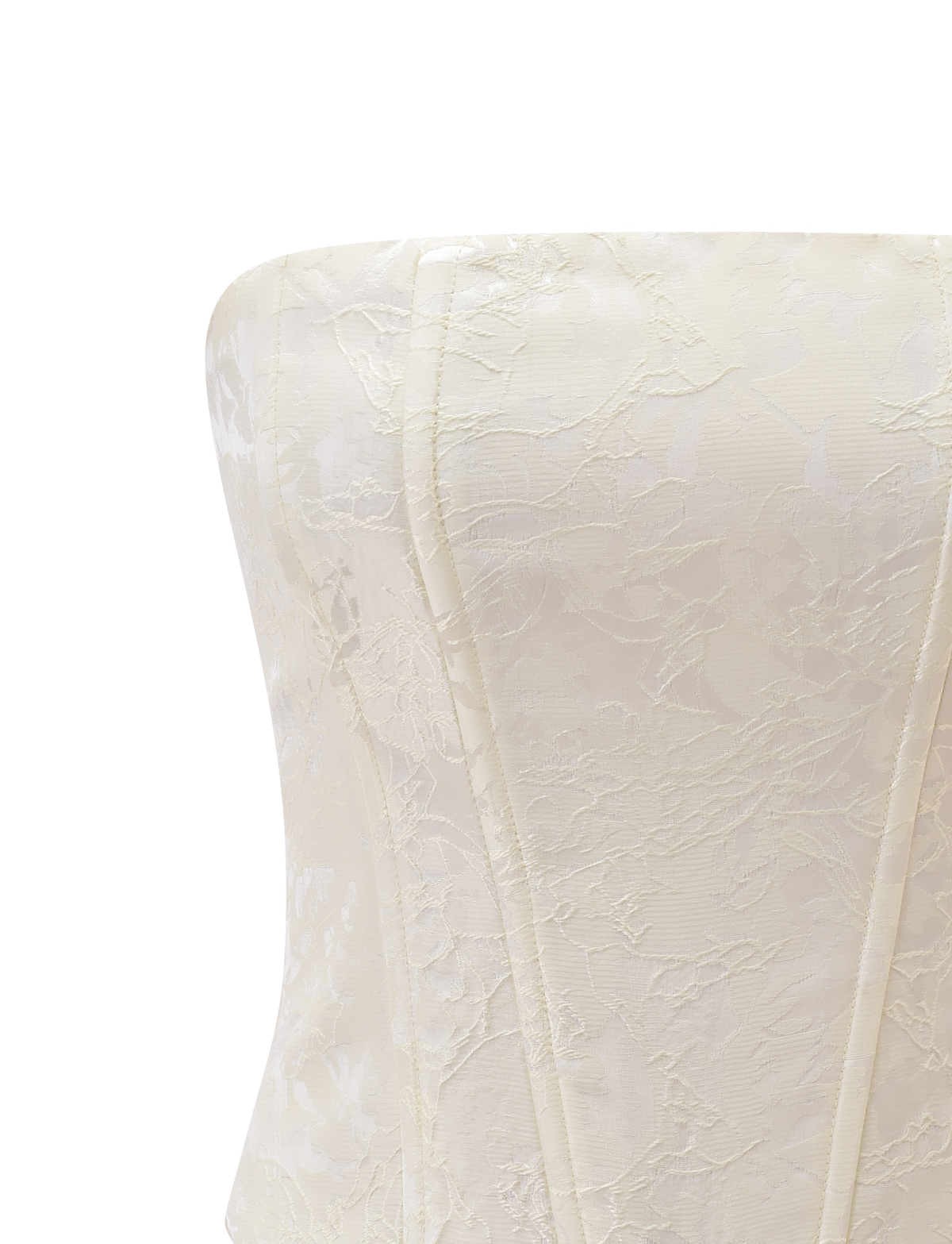 Close-up of the LANIA CORSET TOP in cream by TIGERMIST, featuring a strapless design with visible boning and refined floral jacquard satin fabric, set against a plain white background.