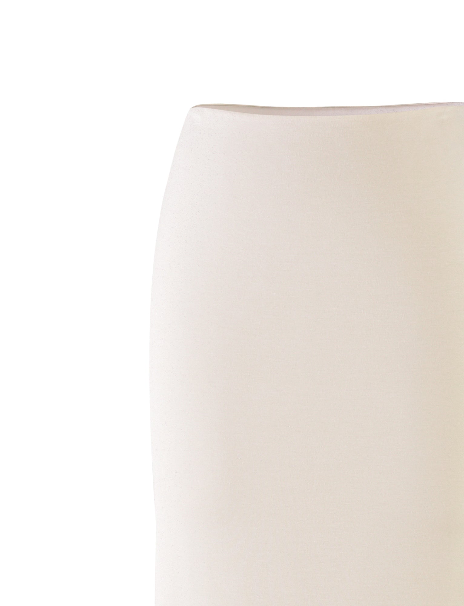 Close-up image of the cream backrest of a chair or sofa, displaying a smooth texture and minimalist fabric upholstery. The background is entirely white, highlighting the simplicity and elegance of this piece in a style that mirrors TIGERMIST's refined design sensibilities, reminiscent of their KAROLINA JERSEY SKIRT in WHITE.