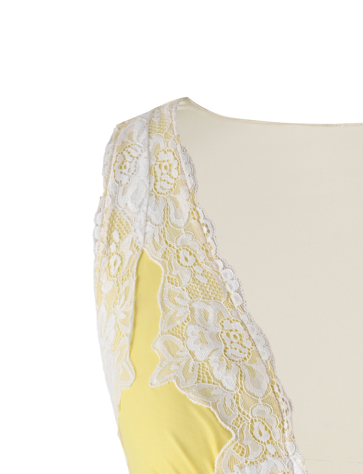 Close-up of the EMBERLY TOP - YELLOW : LEMON by TIGERMIST, showcasing its light yellow fabric and a delicate white lace trim along the neckline and armholes. The lace features a floral pattern, adding an elegant touch to the garment. The background is plain and off-white.