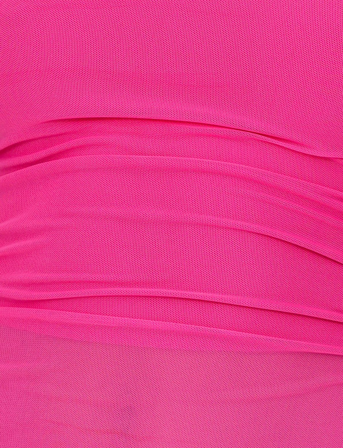 Close-up of the HARRIETT TUBE TOP - PINK by TIGERMIST shows bright pink, stretchy semitransparent mesh with horizontal gathered folds, giving a textured, layered effect that enhances its bodycon fit.