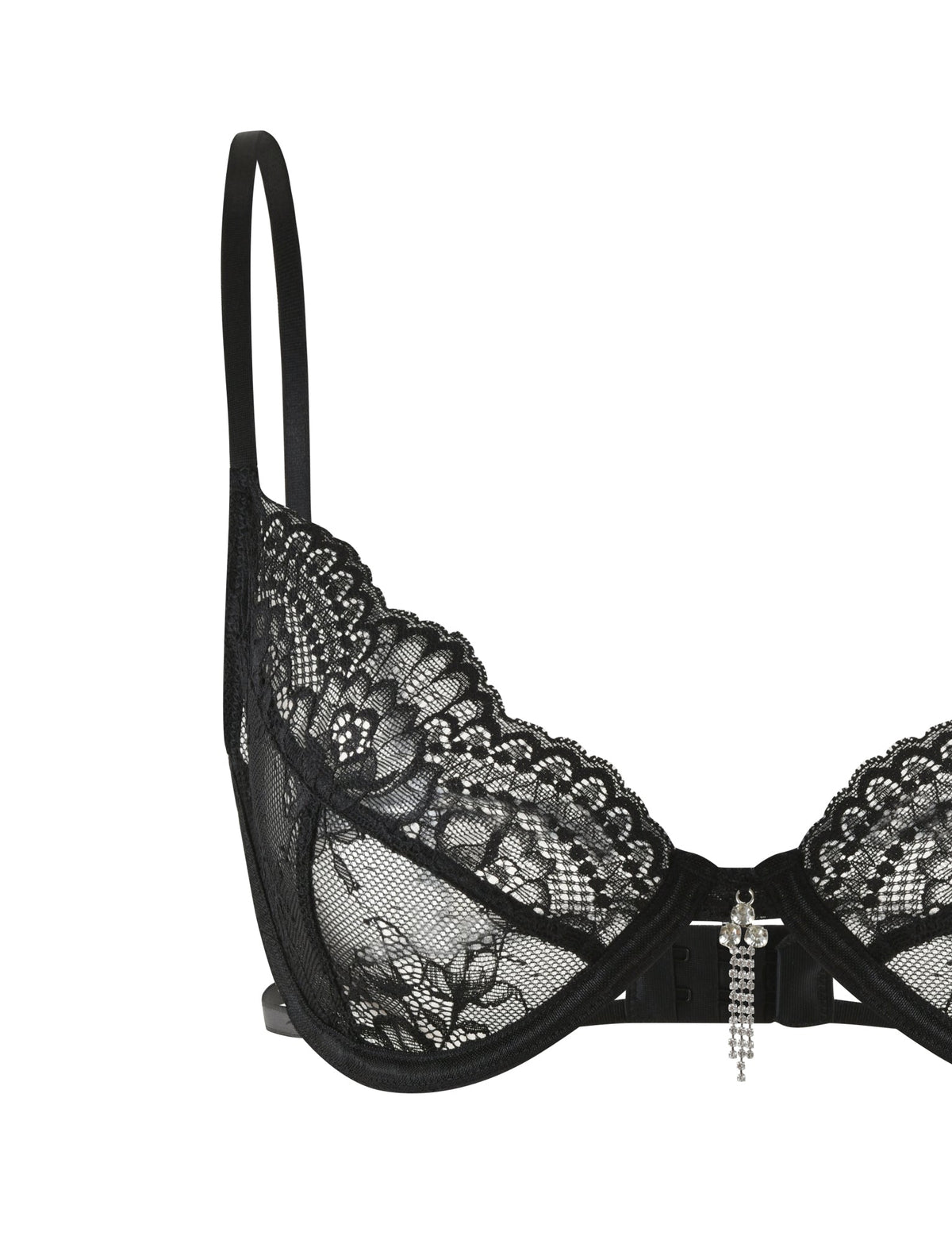 The JORDAN SET - BLACK by TIGERMIST is a sophisticated and alluring black lace intimate set, featuring a delicate floral-patterned bra with thin straps, a semi-sheer design, and an elegant rhinestone charm at its center.