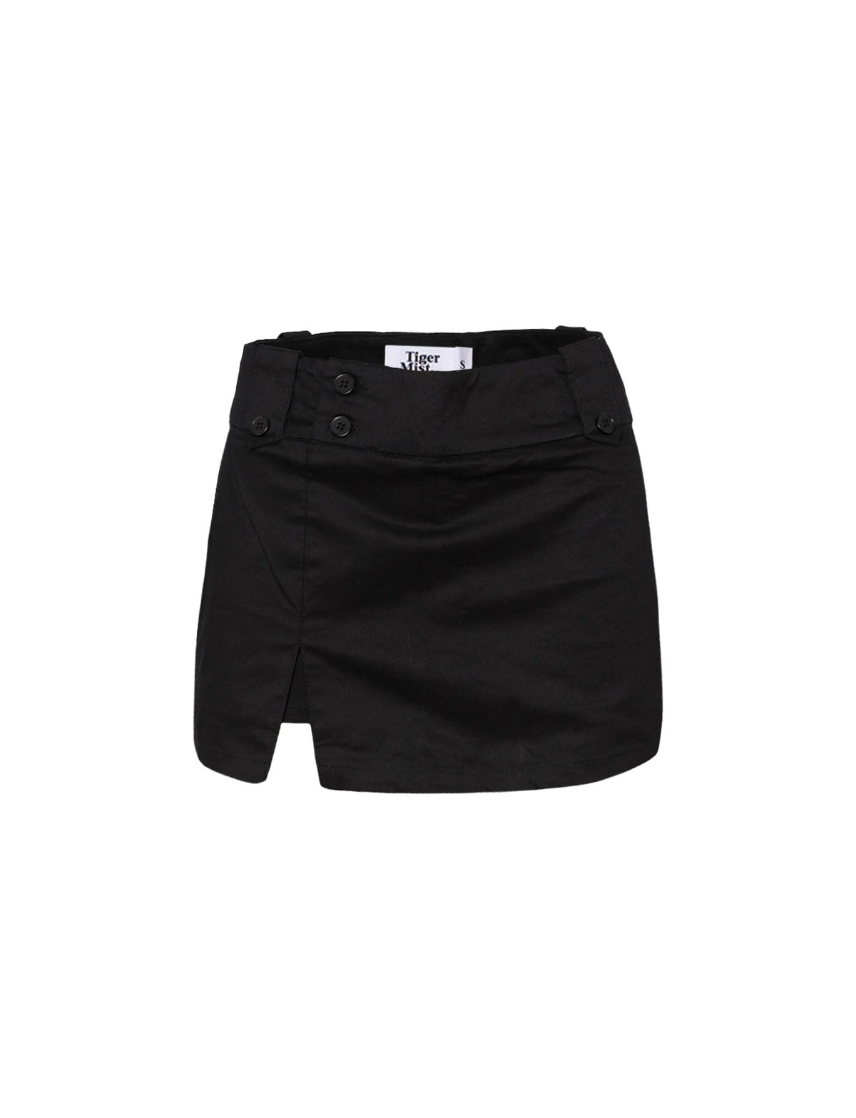 The KITTIE SKORT - BLACK by TIGERMIST is a mini skort with button details at the low-rise waistband, a small side front slit, and a visible inner label that reads "Tiger.