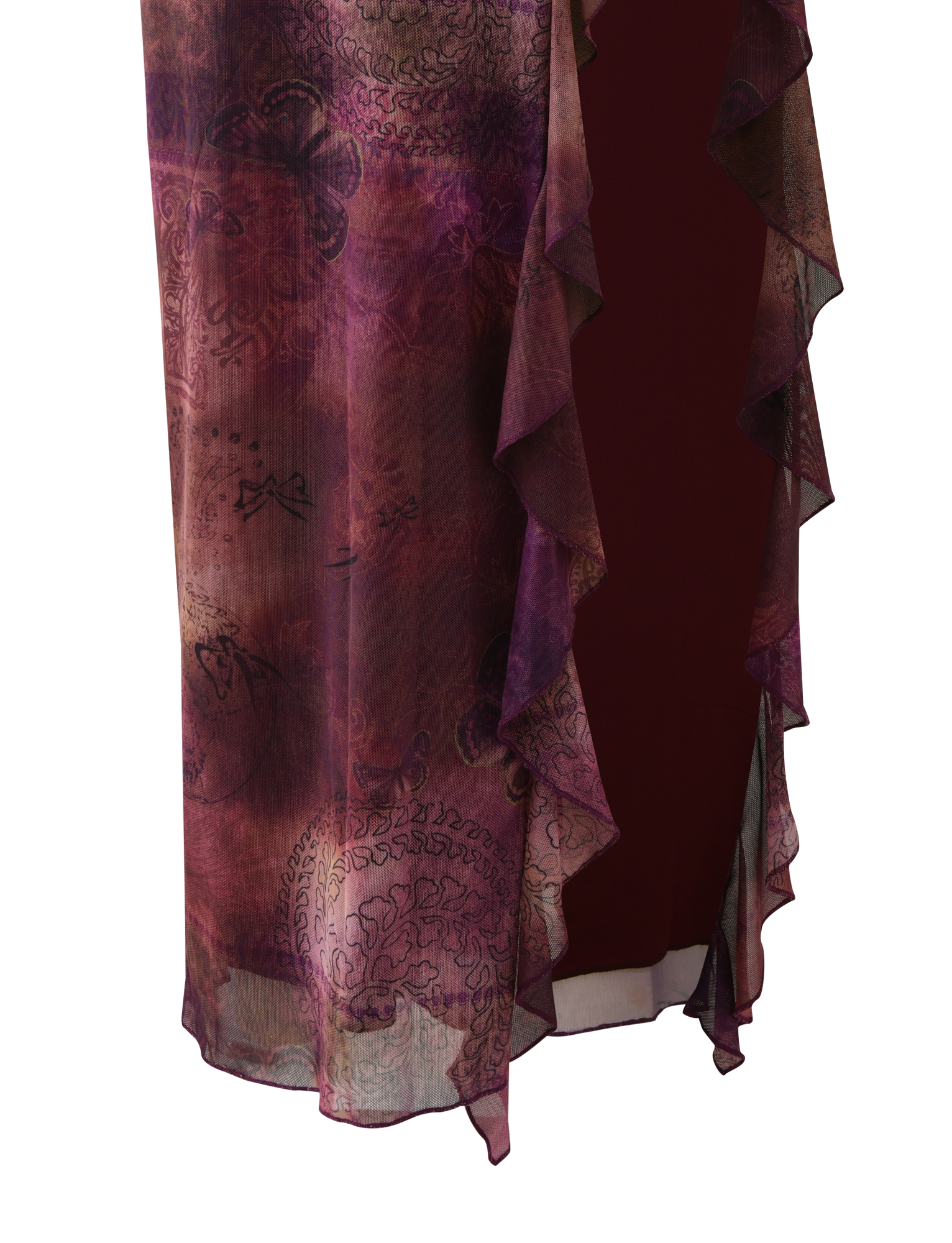 A close-up of TIGERMIST’s THEO SKIRT in Plum Butterfly Paisley, showing sheer purple and burgundy patterned fabric with waterfall ruffle edges and abstract floral motifs draped over a dark background.